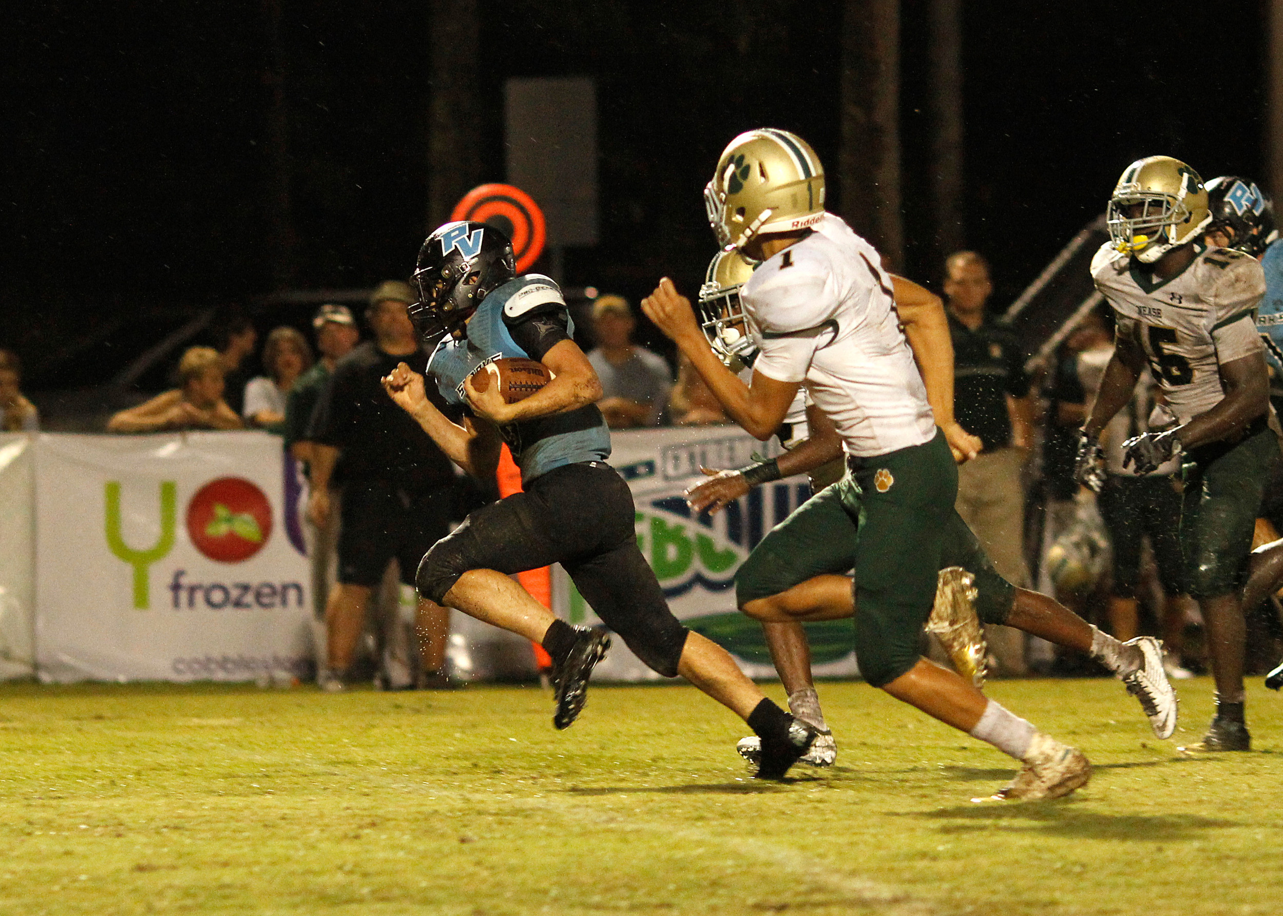 Hal Swan of the Sharks busts up the middle for the final Ponte Vedra touchdown