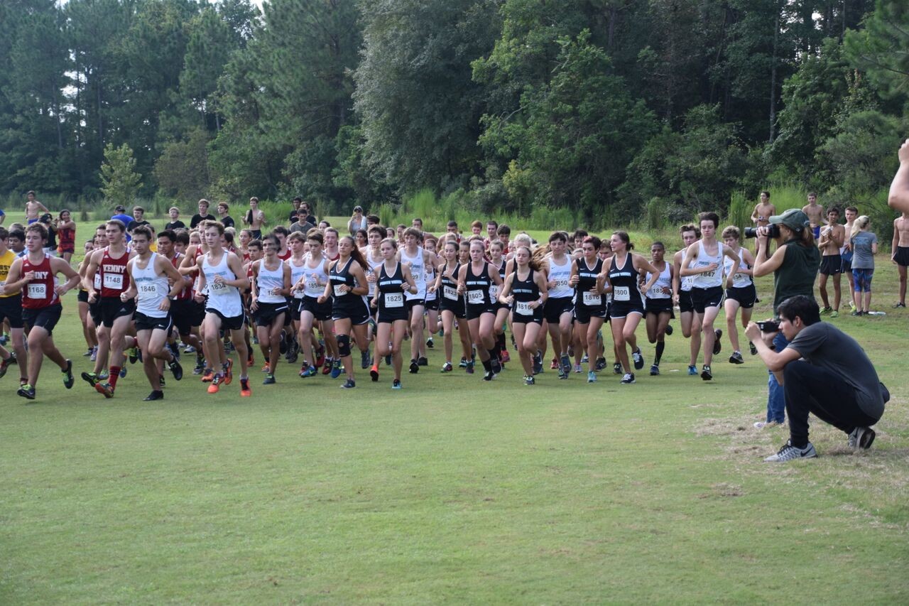 Planners at the UNF invitational cross country event this month had both boys and girls junior varsity teams running at the same time, placing more than 400 runners on one tight course.