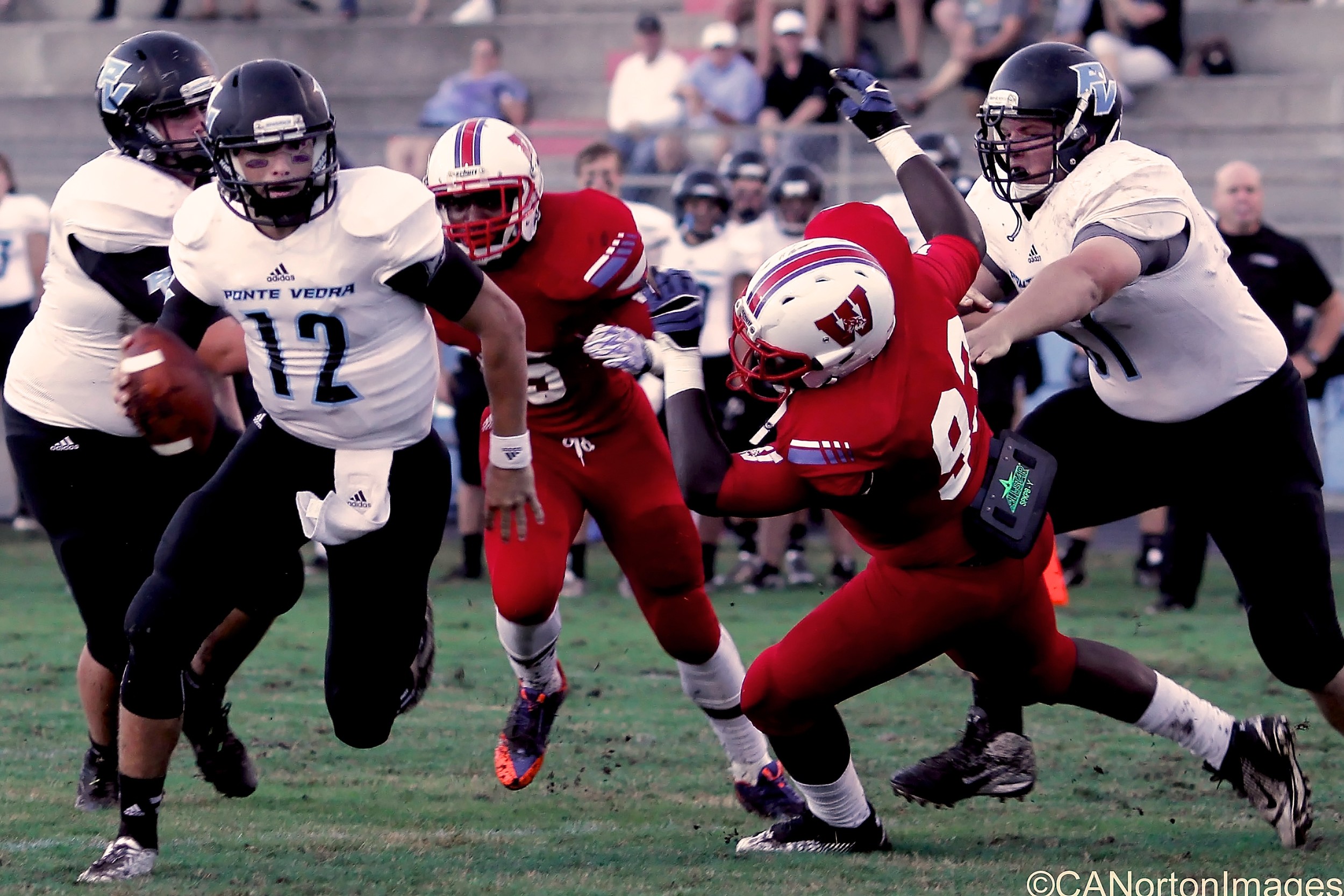 #12 Nick Tronti runs for a touchdown behind a block from #71 Carter Lewis