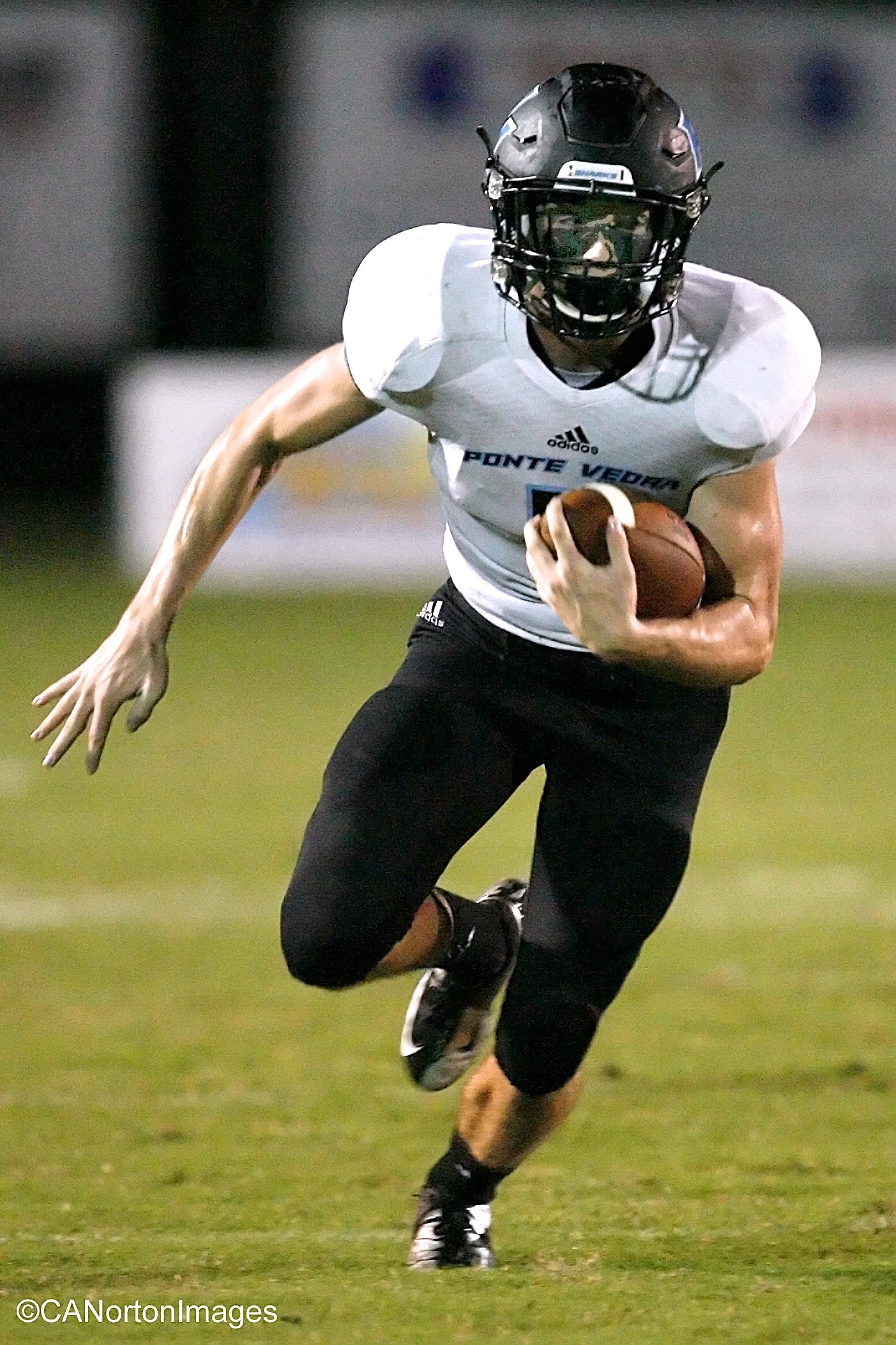 Quint Boyd #5 of the Sharks returns a kickoff for 60 yards to give the Sharks good field position
