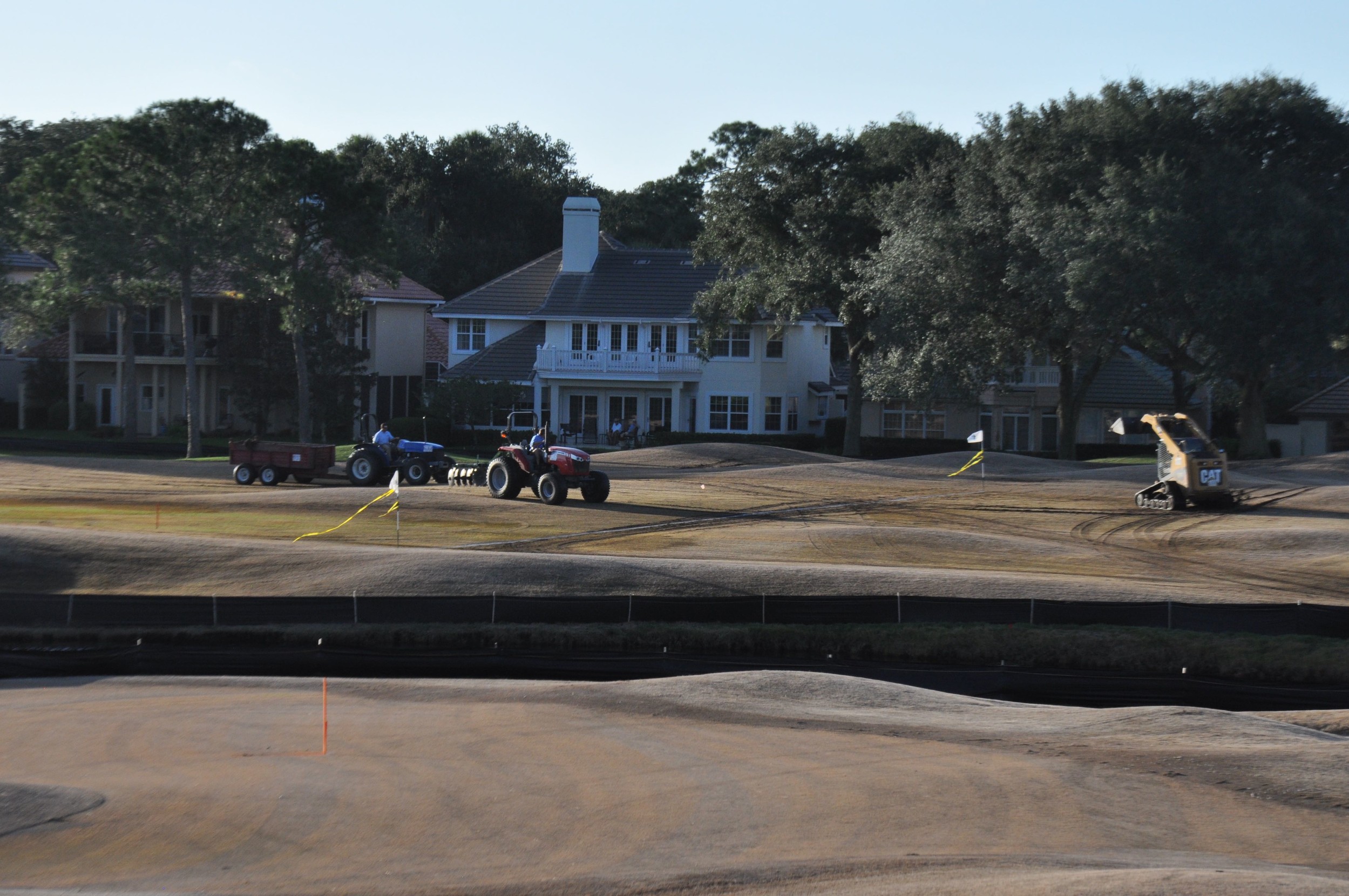 As part of the events on Sept. 19, a bulldozer and tractor raced down the 18th fairway.
