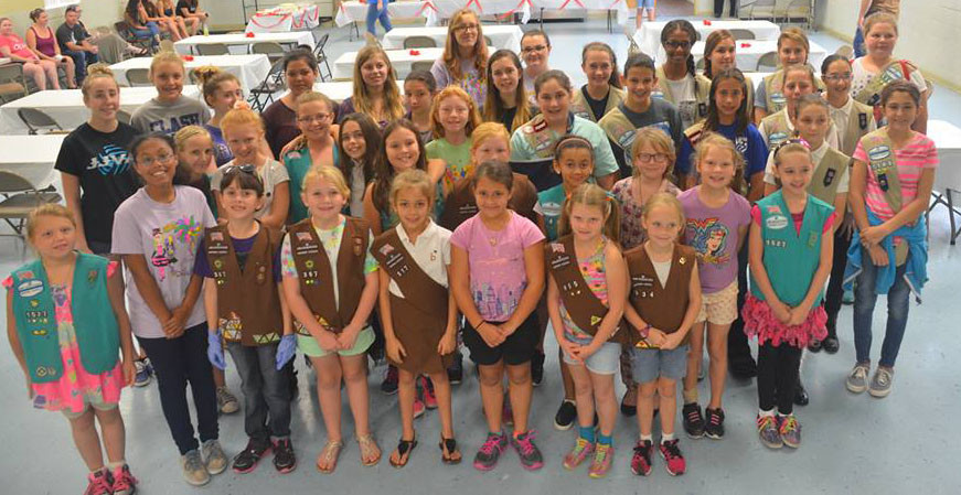 Dozens of Girl Scouts from St. Johns and Flagler counties worked together Sunday on an event to help farmworkers in Hastings. The troops made and served dinner and helped give the workers a day of relaxation and fun.