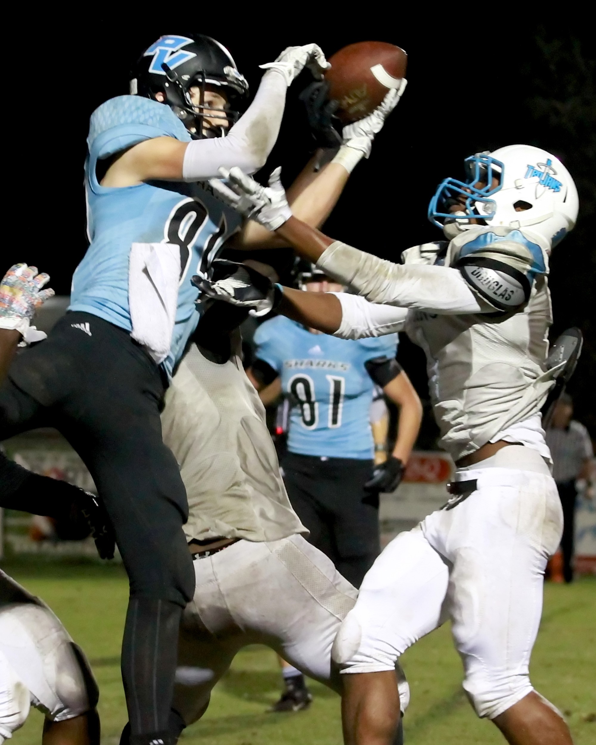 Jarret Stepp #84 goes high to catch a pass for the Sharks.