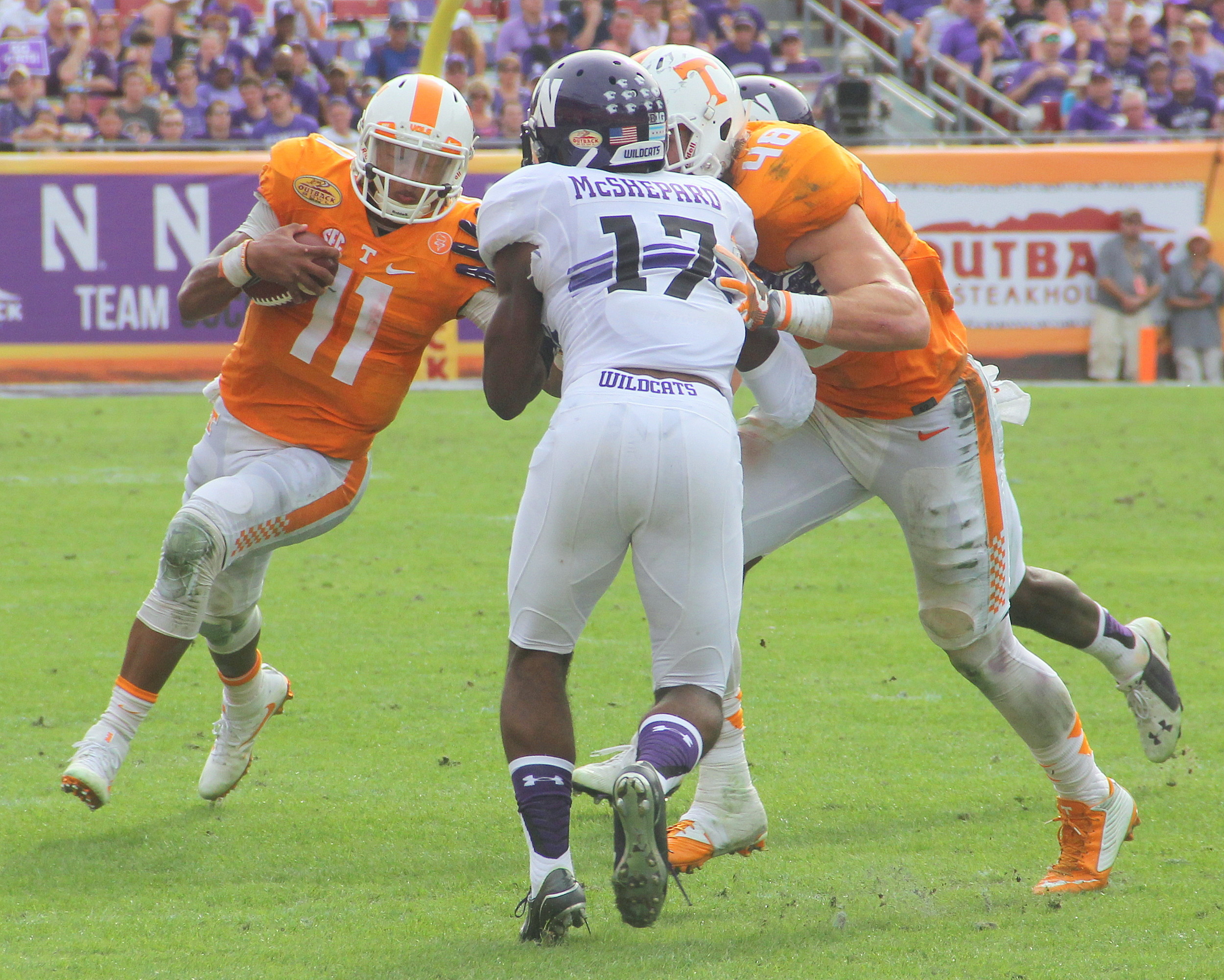 Tennessee QB Joshua Dobbs (11) ran for 48 yards and two touchdowns. Dobbs also completed 14 of 25 passes for 166 yards in a victory over Northwestern in the Outback Bowl.