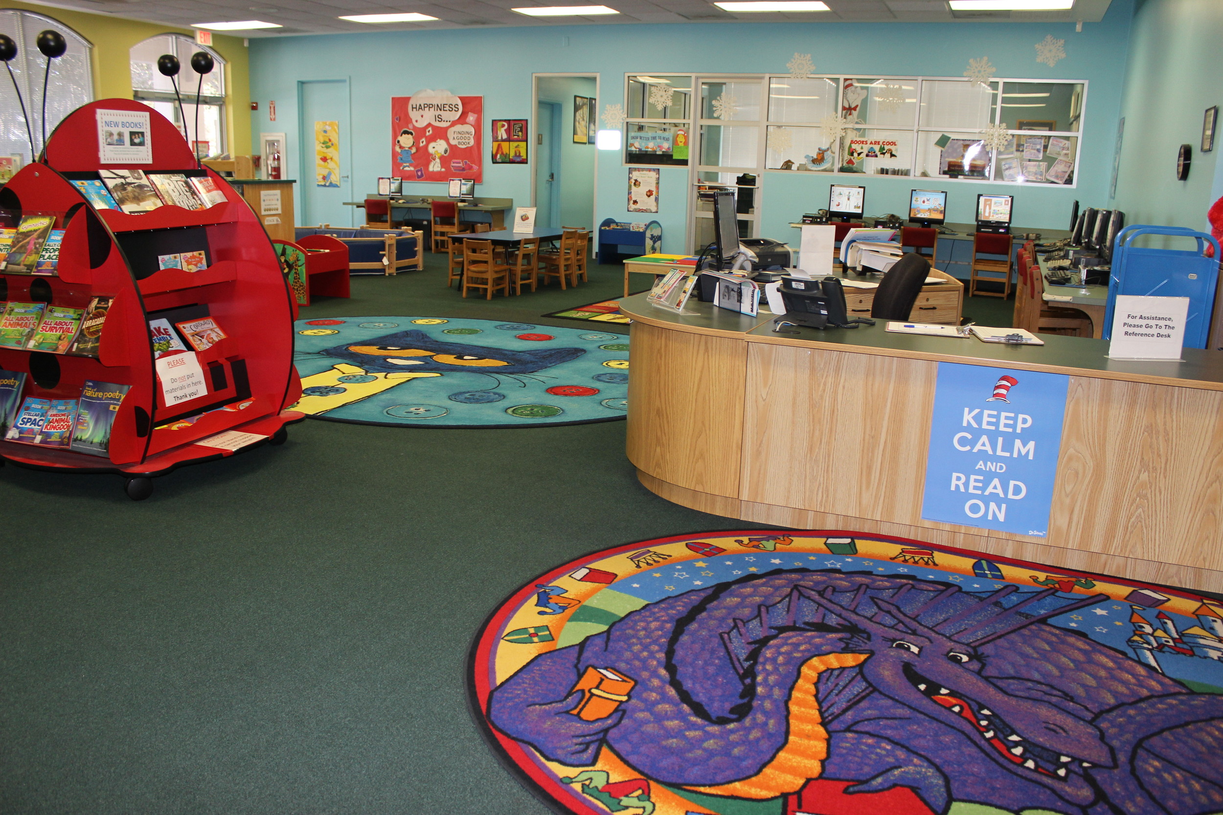 The children’s area has been updated with fresh coats of paint and a large Pete the Cat character rug. The bean bag chairs will be replaced with plastic chairs and tables.