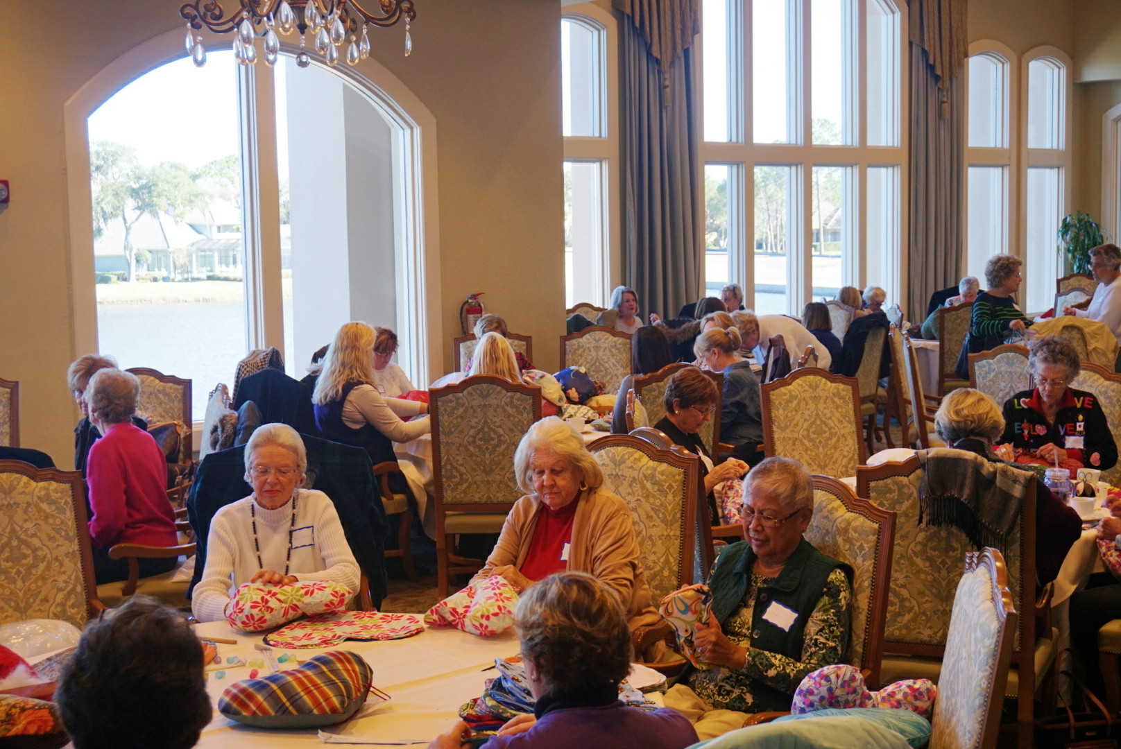 Guild members and volunteers fill every table in the Plantation's dining room for the cause