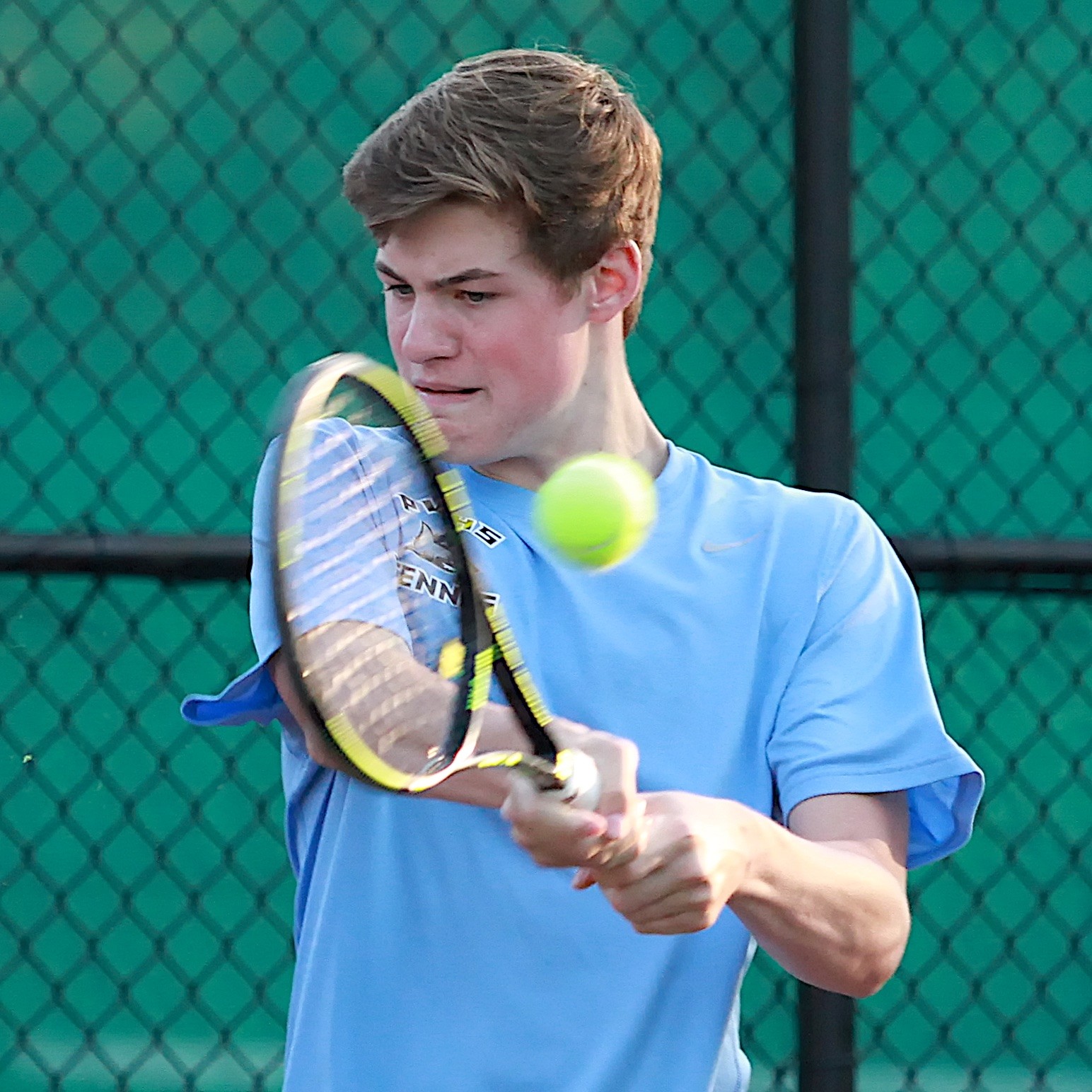 Davis Massey of the Sharks concentrates as he hits a backhand against Bertram.