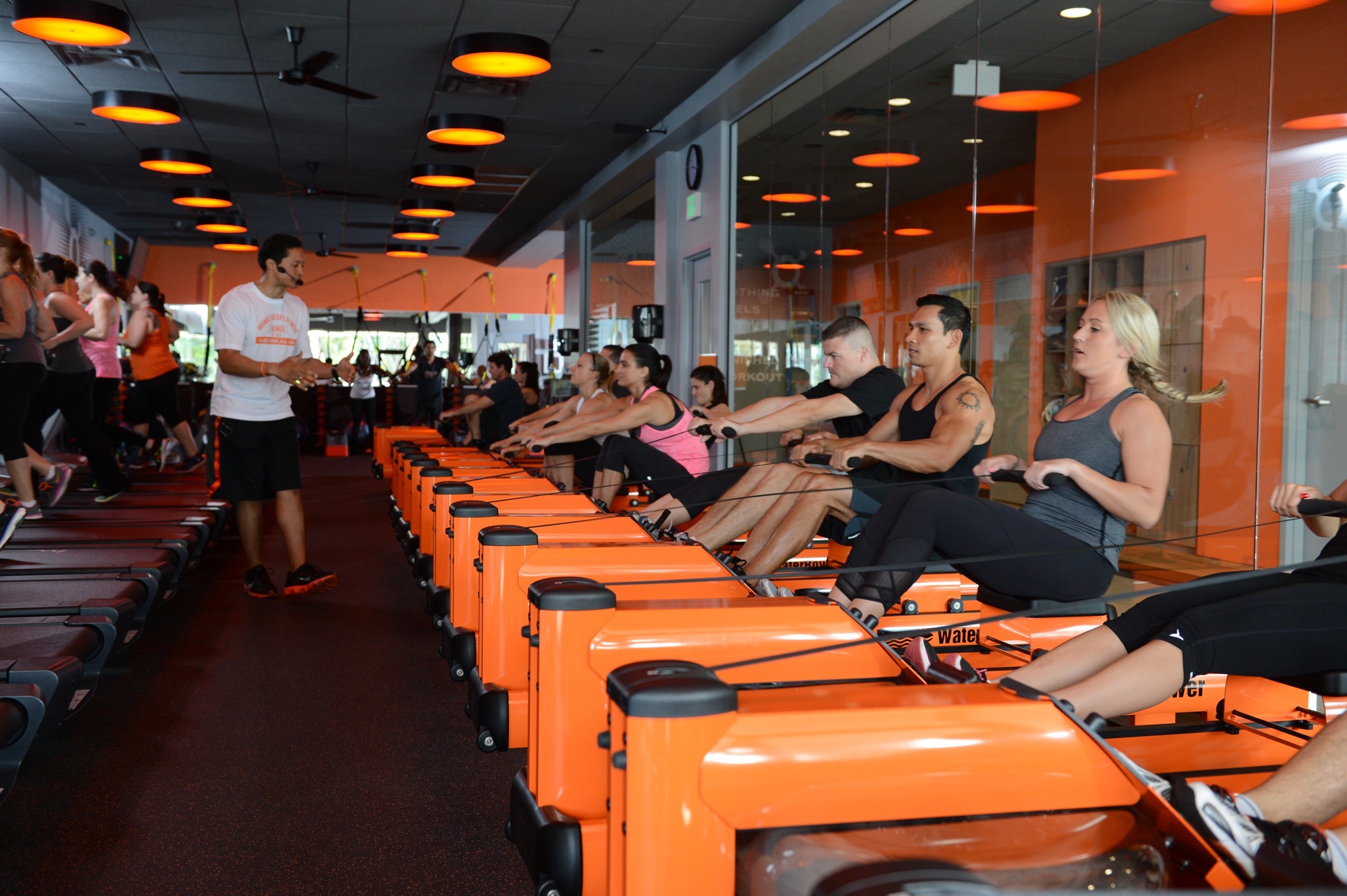 Trainers guide participants through a 60-minute workout broken down into intervals of cardiovascular and strength training. Each participant is given a heartrate monitor to wear that they and the trainers can visually monitor via one of the several TV screens located in the fitness studio.
