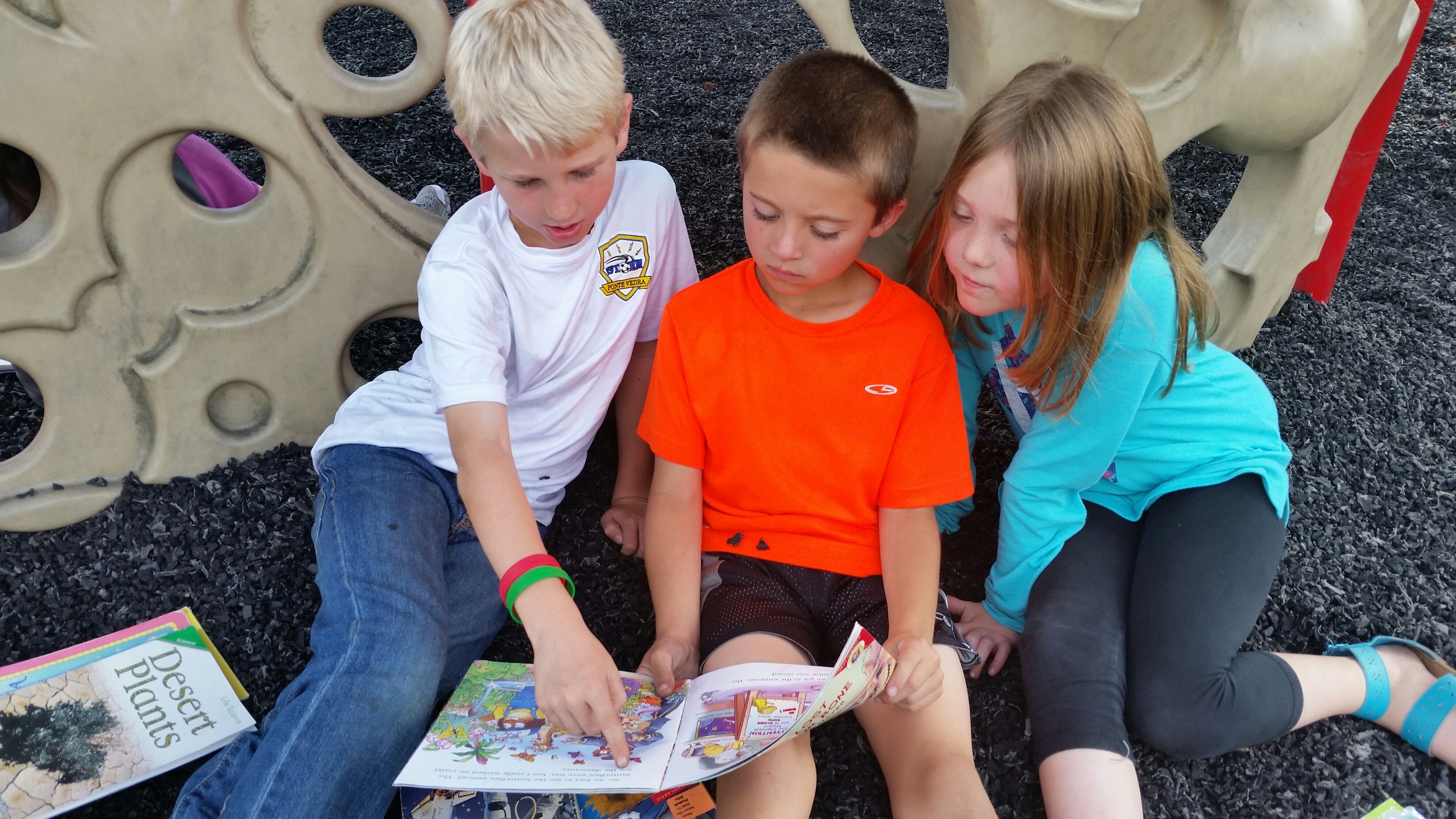 Second grade students Levi Usry and Brody Kaul enjoy reading with first grade student Lyla Peters through the “Reading Buddies” partnership between Mrs. McCall’s and Mrs. Gregg’s classes.