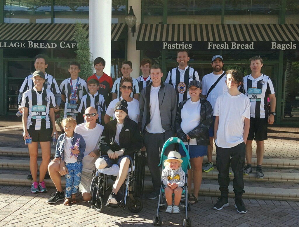 Members of the Landrum Middle School boys’ soccer team and Ponte Vedra Storm U-14 Gold soccer players, soccer parents, team coach, Stuart Impey, and Ethan Branck and family, at the Run 13.1 and 5K April 3 at the Jacksonville Landing.