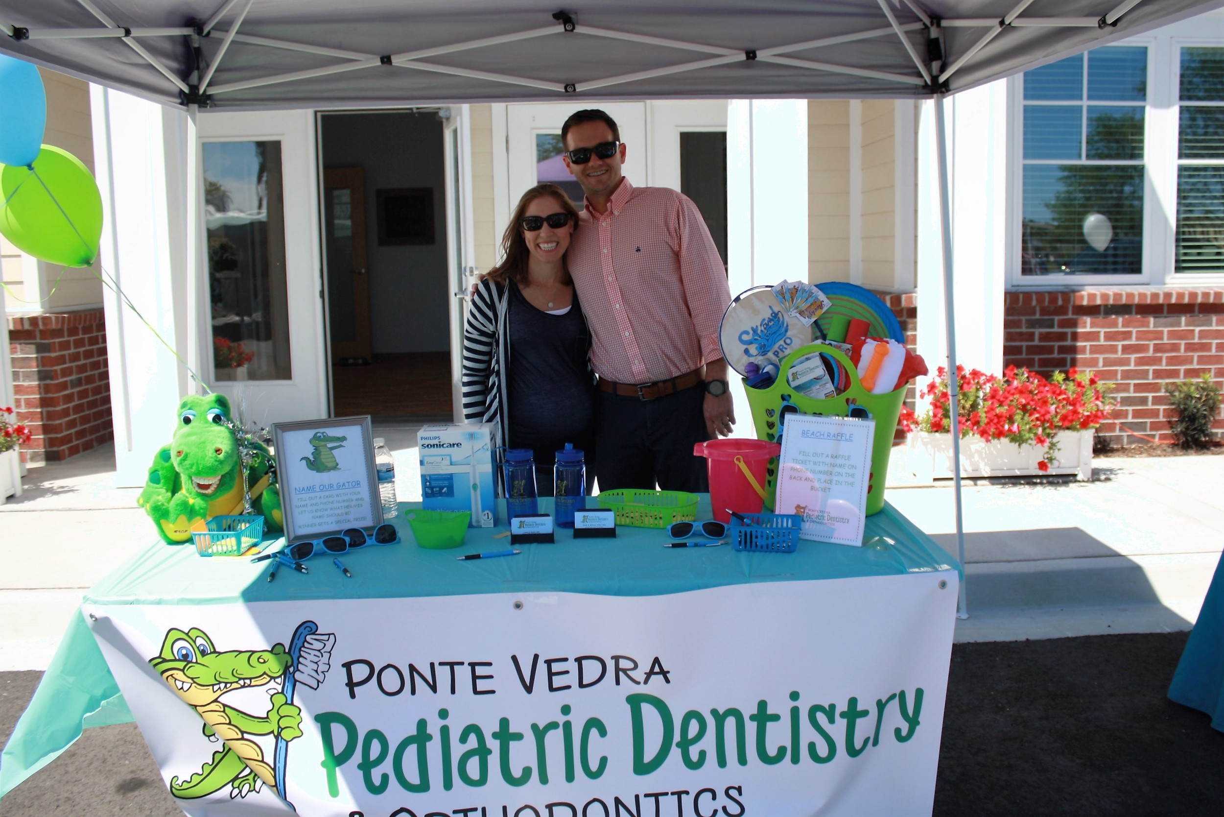 Dr. Lindsay Maples and Dr. Derek Hoffman welcome guests to Ponte Vedra Pediatric Dentistry and Orthodontics at the grand opening celebration of the new Town Plaza offices in Nocatee Town Center. Fun 4 First Coast Kids, Ponte Vedra Plastic Surgery and other businesses joined in the celebration, which featured children’s games and activities, prizes, a Gather 2 Game truck, refreshments and more.