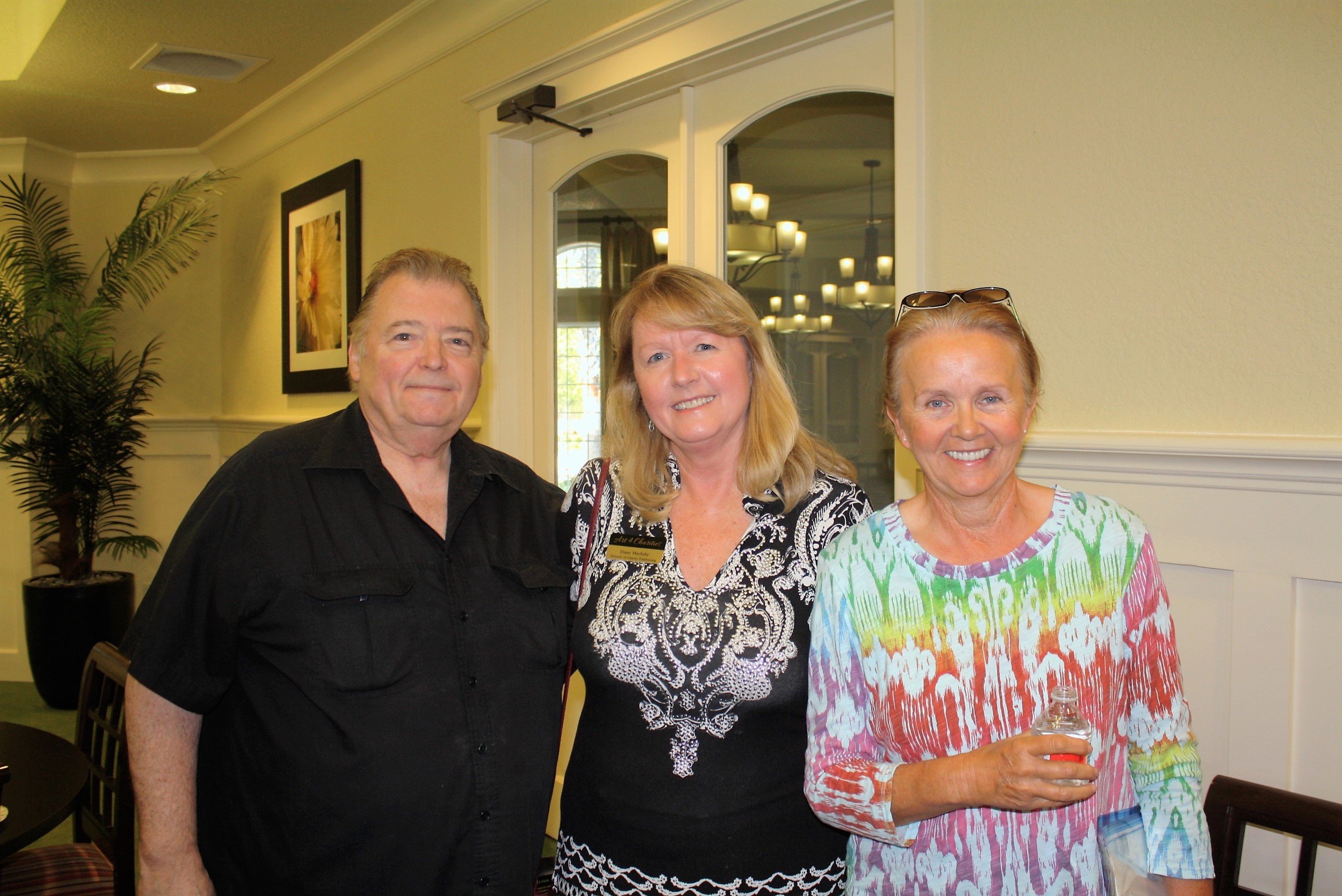 Terry and Diane Machaby of Art 4 Charities and Edith Andersen, all of Del Webb