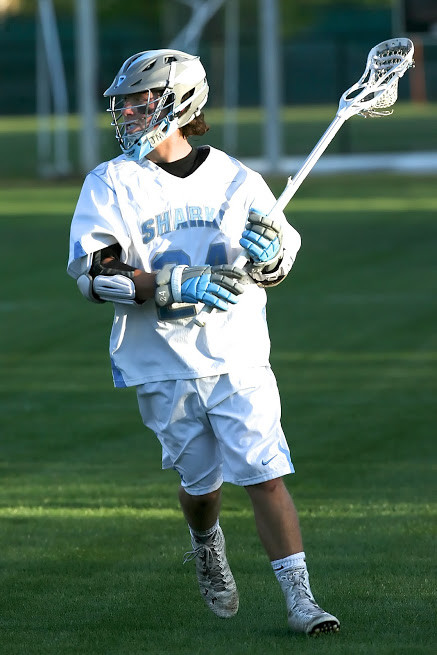Matt Keeler of the Sharks looks to pass against Lake Brantley. Keeler scored two goals and four assists in the game.