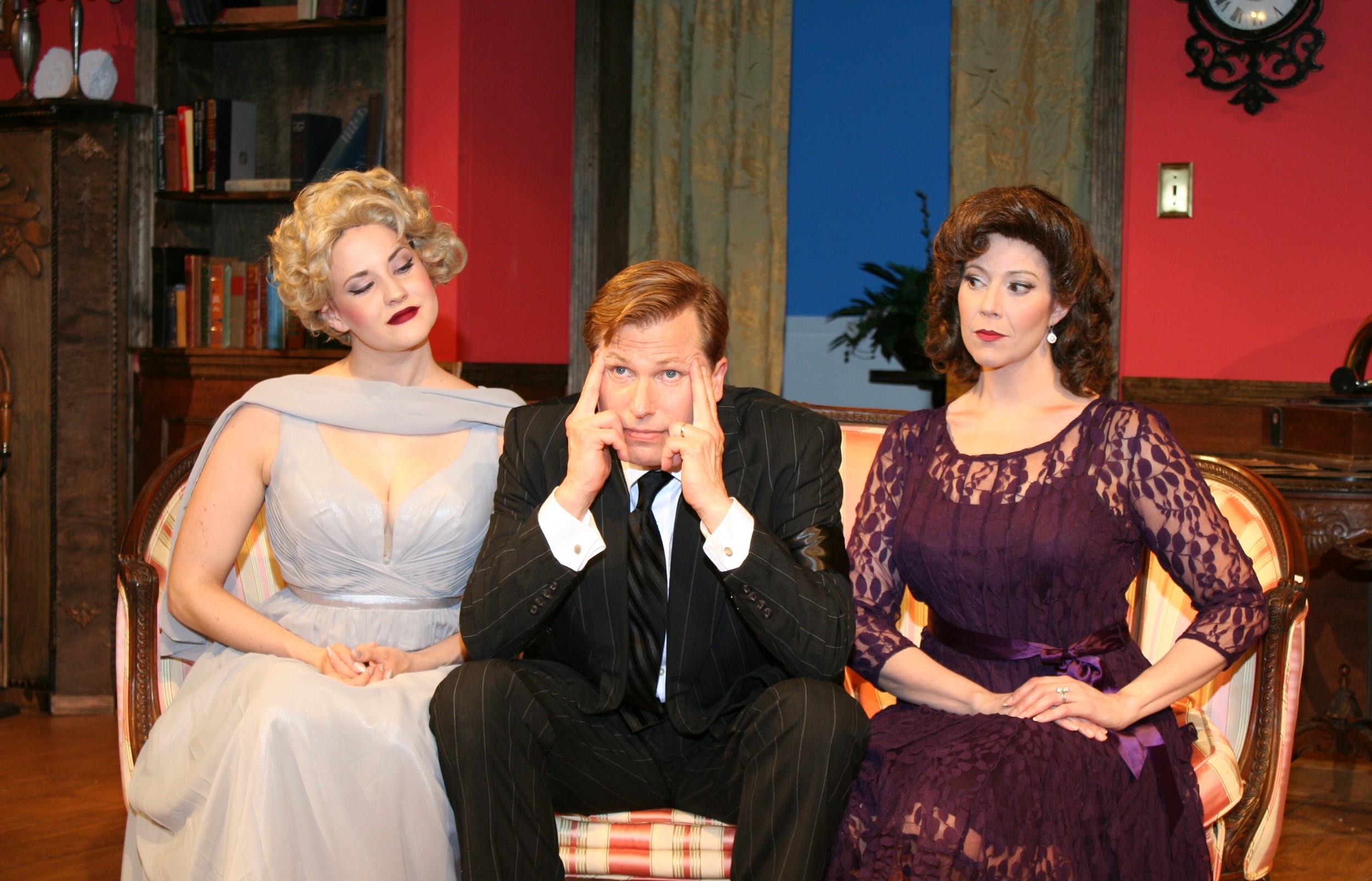 Charles Condomine (David Arrow) is caught in a supernatural love triangle with the ghost of late wife Elvira (Jessica Booth) and his second wife, Ruth, (Laura Hodos) in the Alhambra Theatre & Dining’s production of Noël Coward’s “Blithe Spirit.”