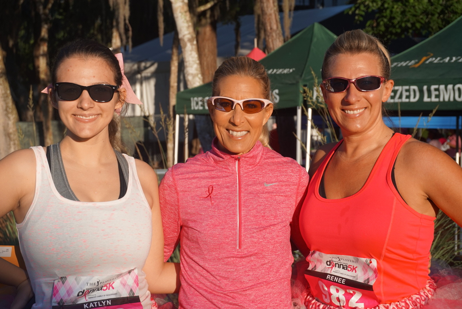 Donna Deegan (center), founder and president of The Donna Foundation with Katlyn Couch (left) and Renee Couch, two sisters running for their friends and sister-in-law