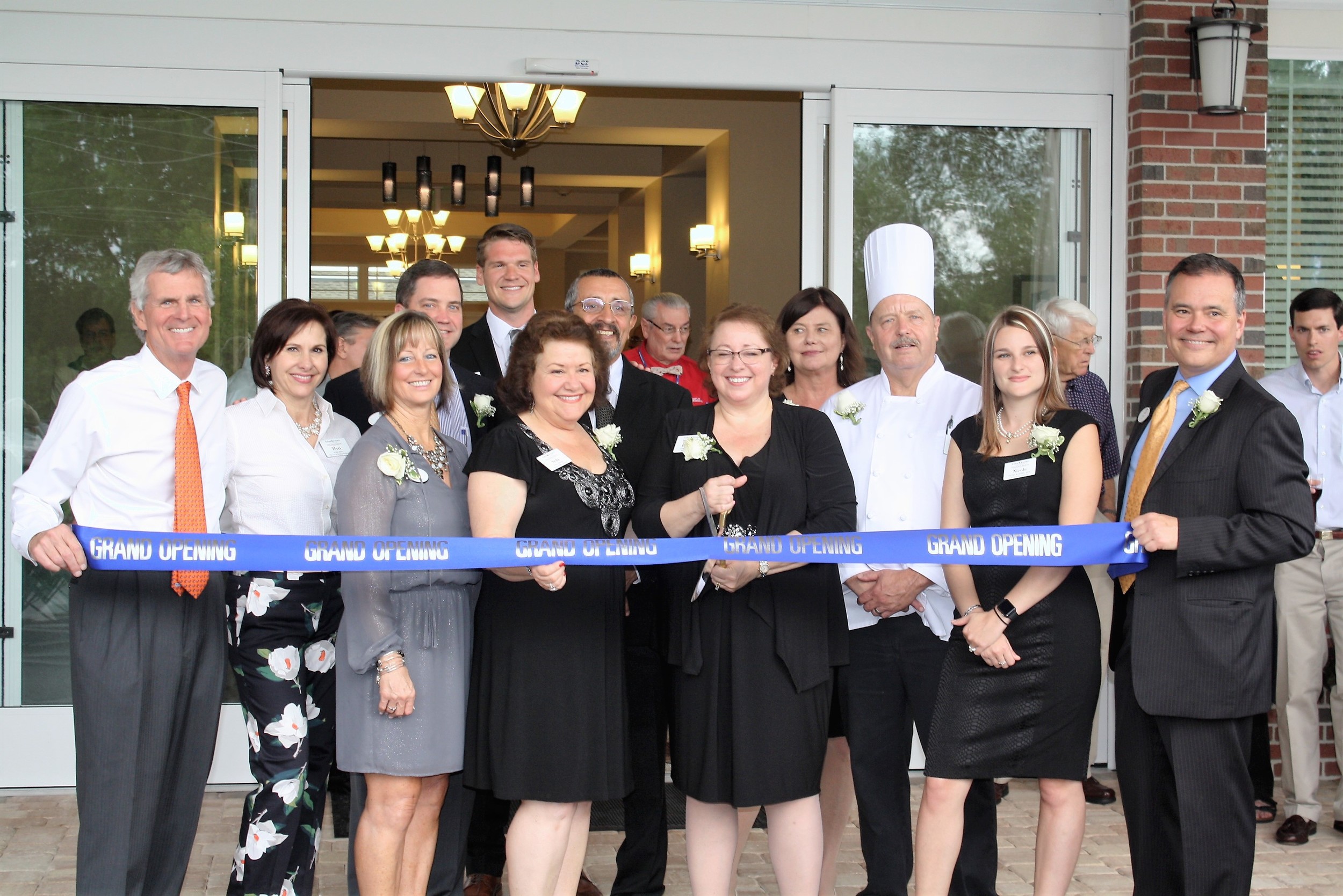 Representatives from The Arbor Company and Whitehall Realty Partners join with representatives from the Jacksonville Chamber of Commerce and the senior care industry to cut the ribbon on the new Arbor Terrace San Jose assisted living and memory care facility