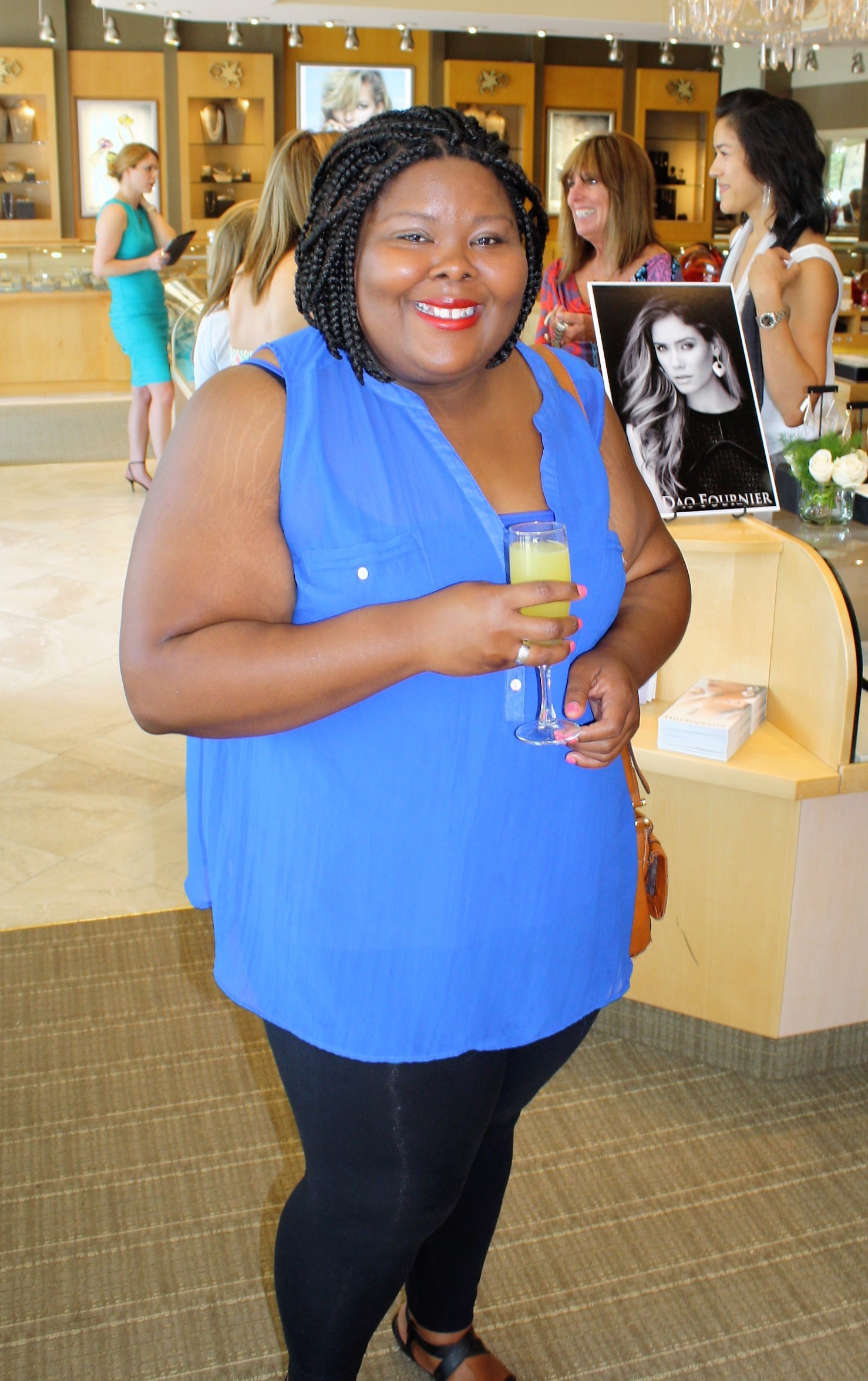 Faith Taylor enjoys a mimosa at the Underwood's event