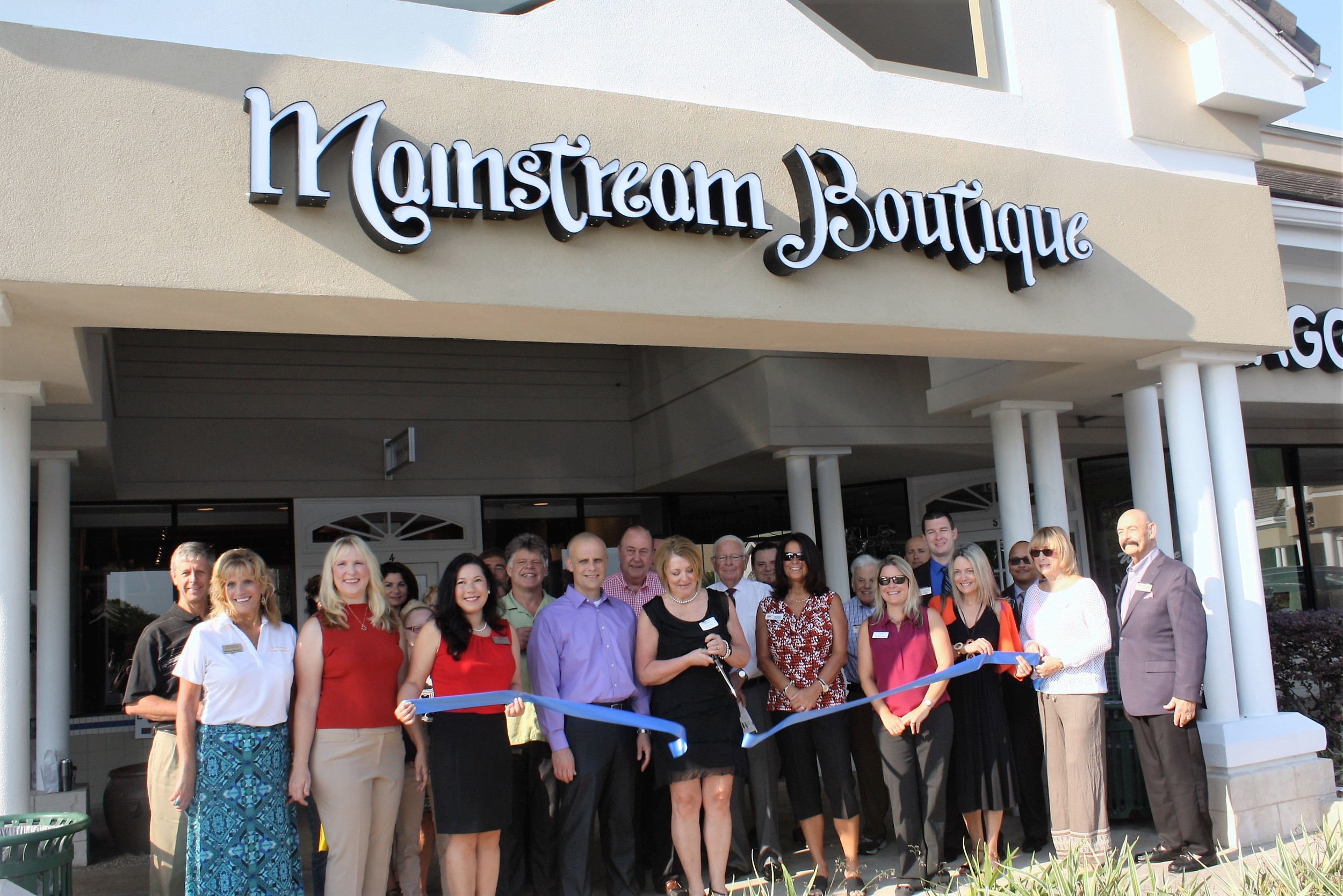 Mainstream Boutique owners Carla and Kurt Miles cut the ribbon on their new store, Mainstream Boutique May 31.