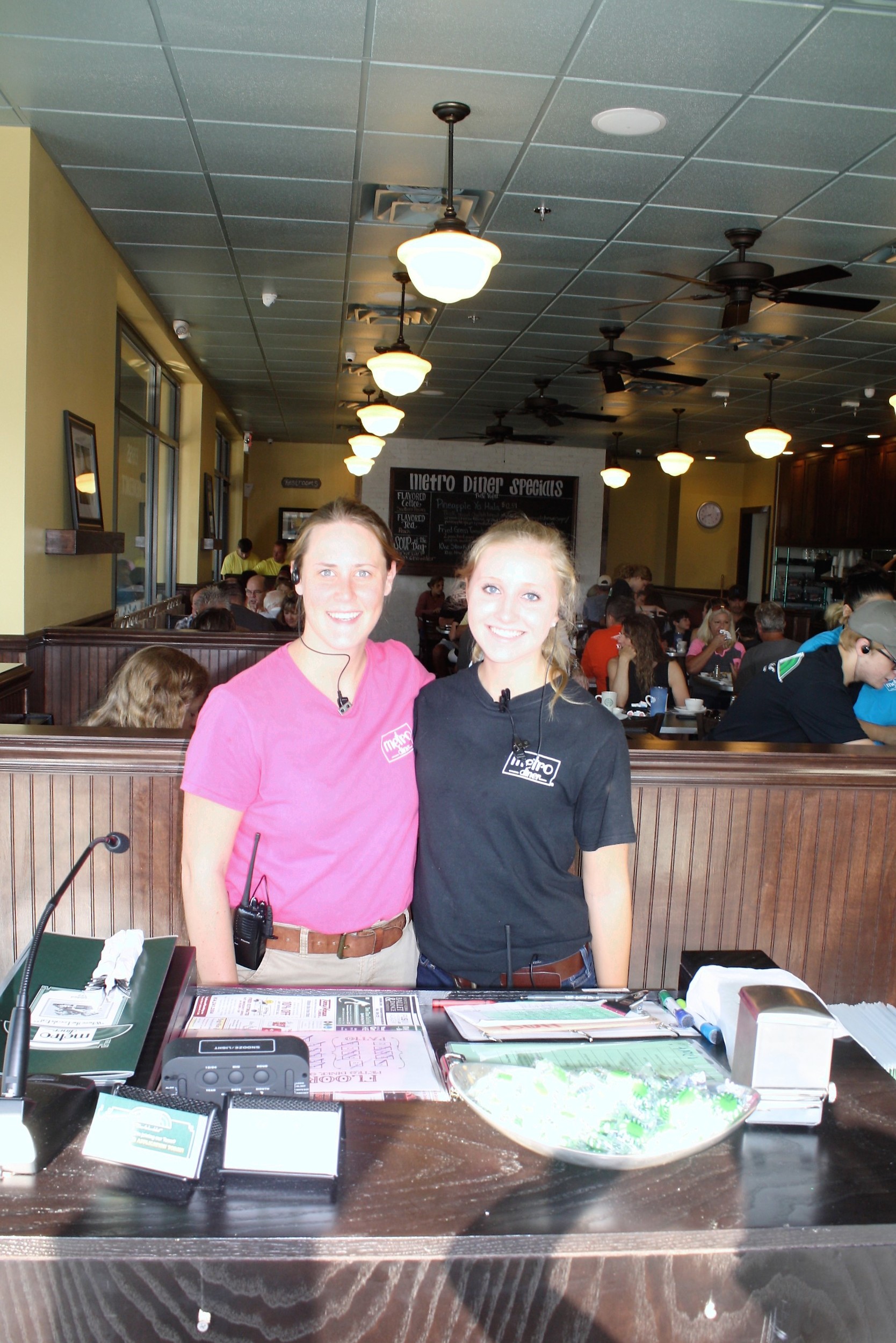 Hostesses Miranda Rasky and Ashton Putnal welcome guests to the Metro Diner.