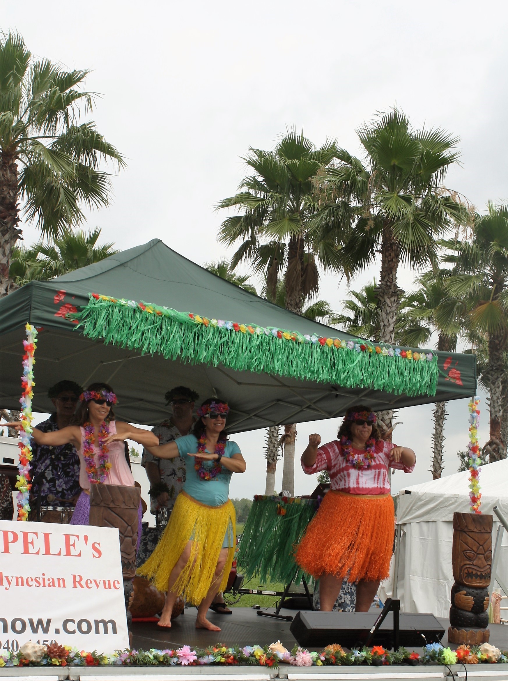 Farmer’s Market attendees get in the act for Prince Pele’s Polynesian Revue.