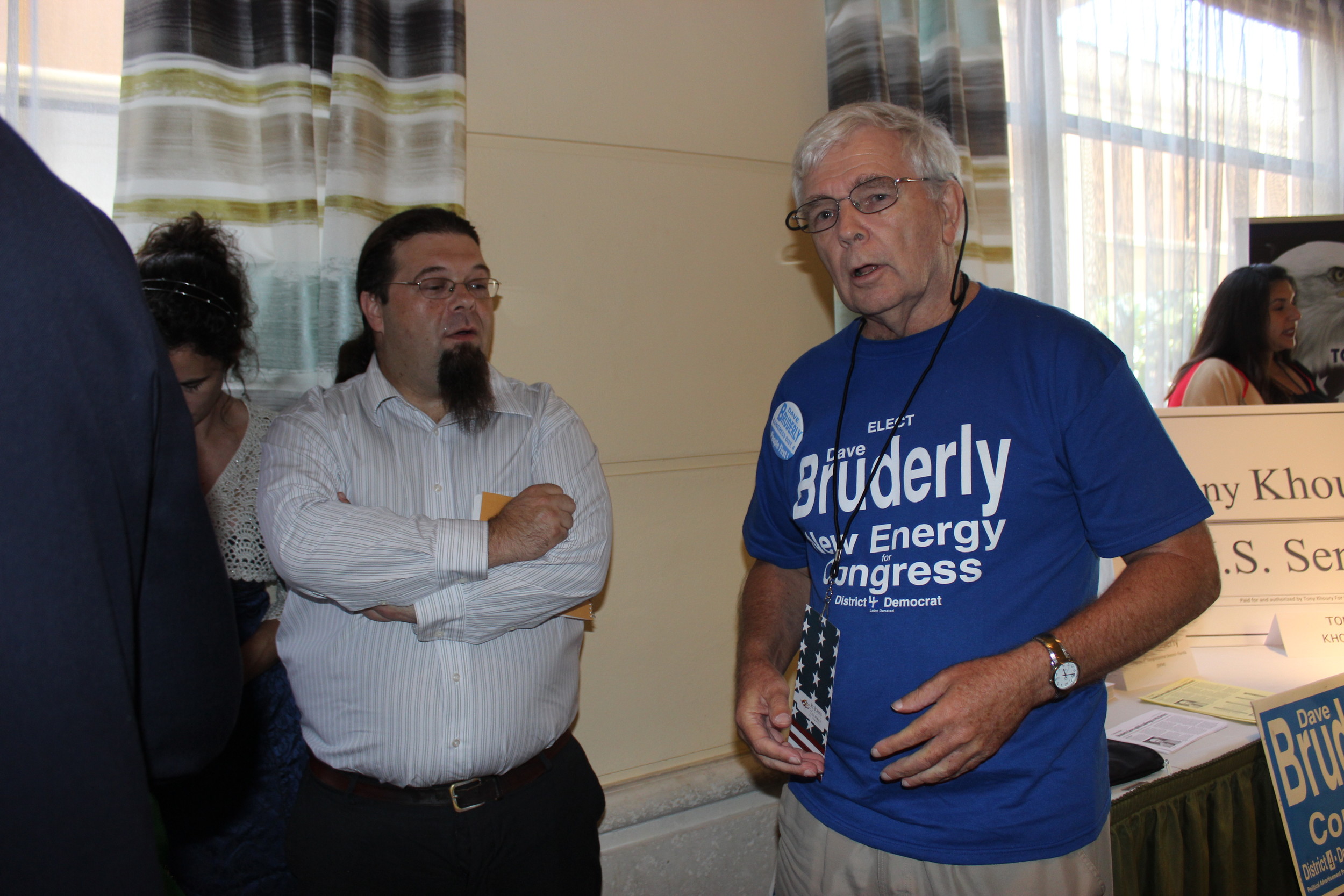 Democratic congressional candidate Dave Bruderly talks with local Democrats.