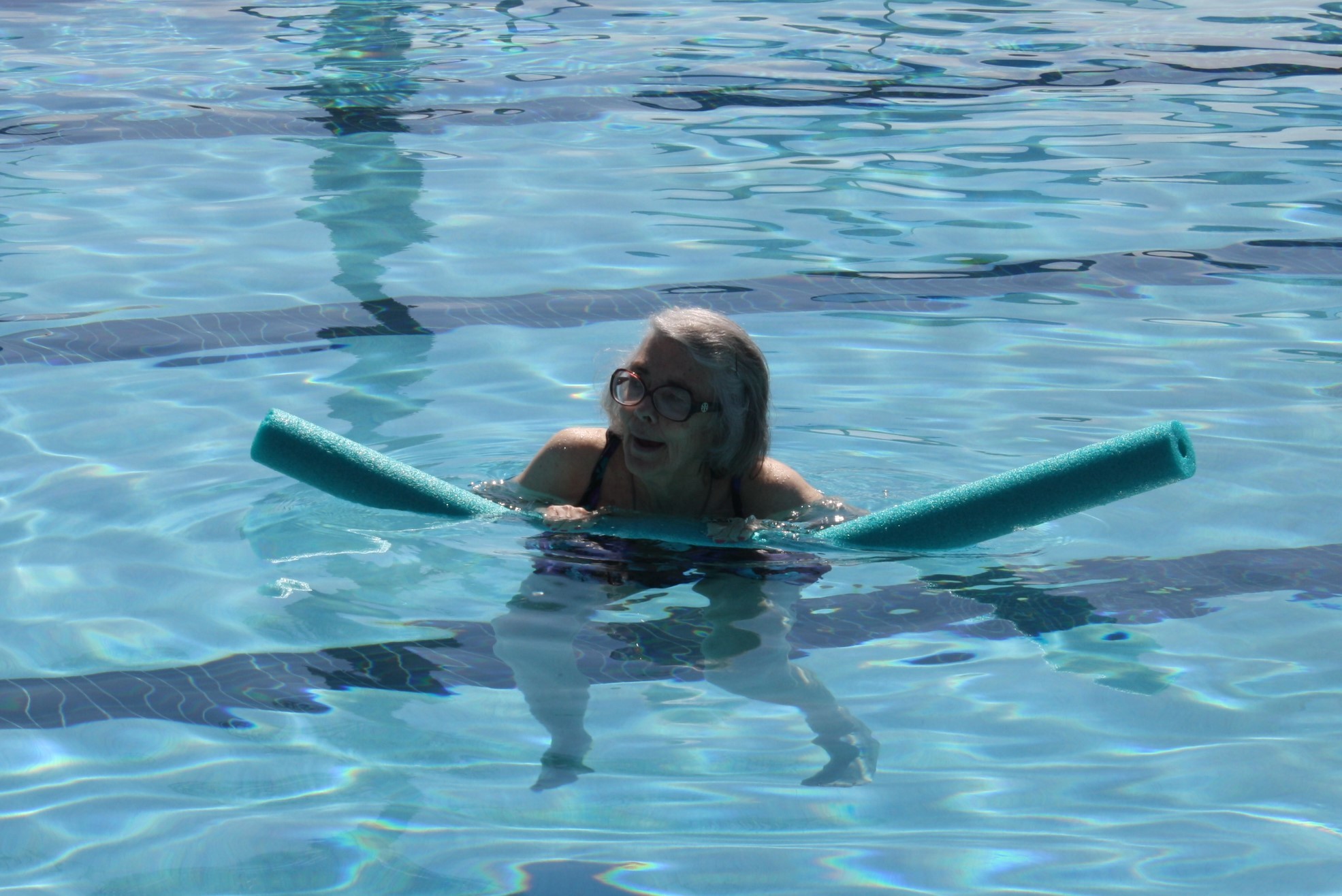 Betsy Flynn enjoys a swim in the pool at The Plantation Beach Club as part of Arbor Terrace Ponte Vedra’s partnership with the Second Wind Dreams program.