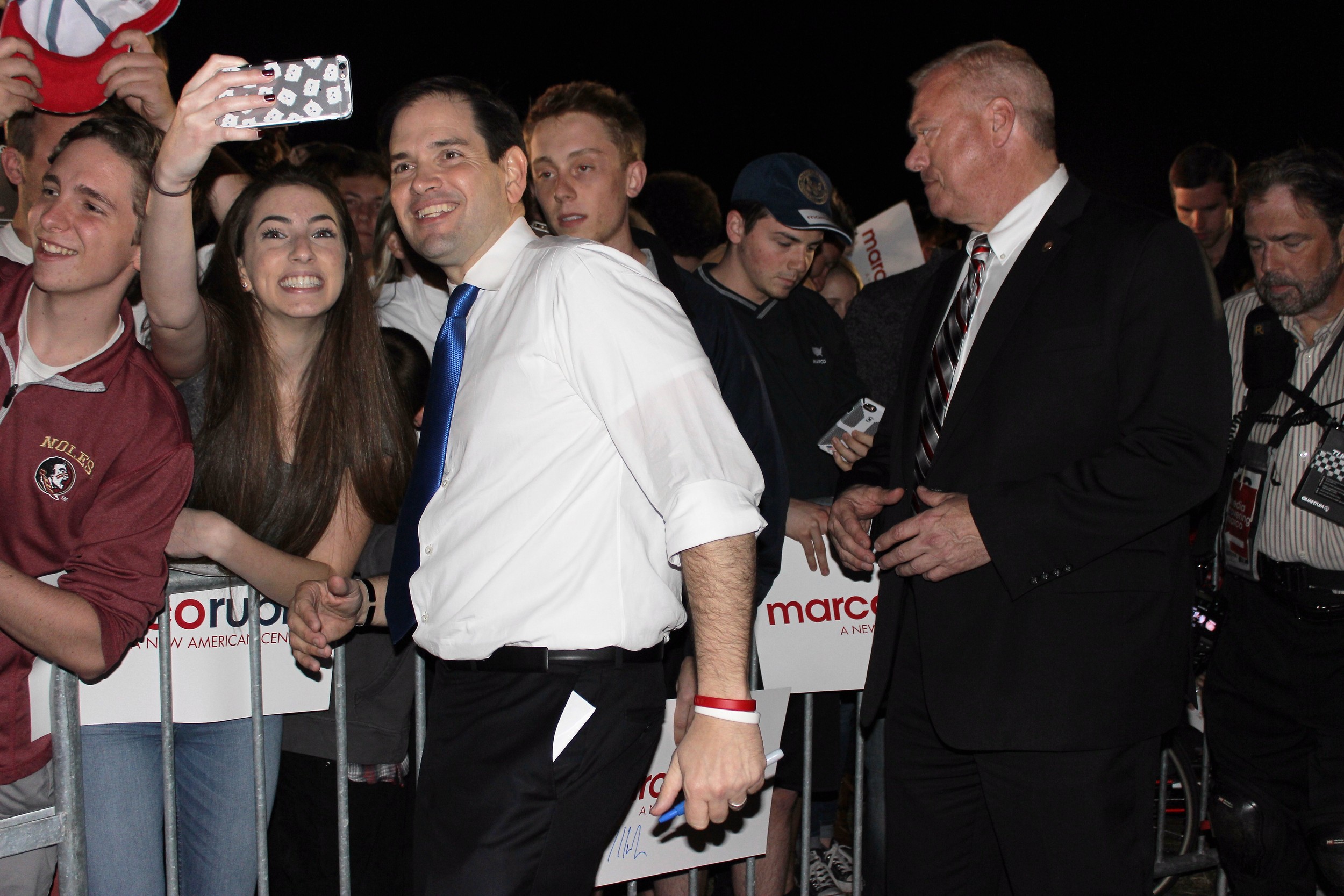Marco Rubio poses for photos while campaigning in Nocatee for president earlier this year