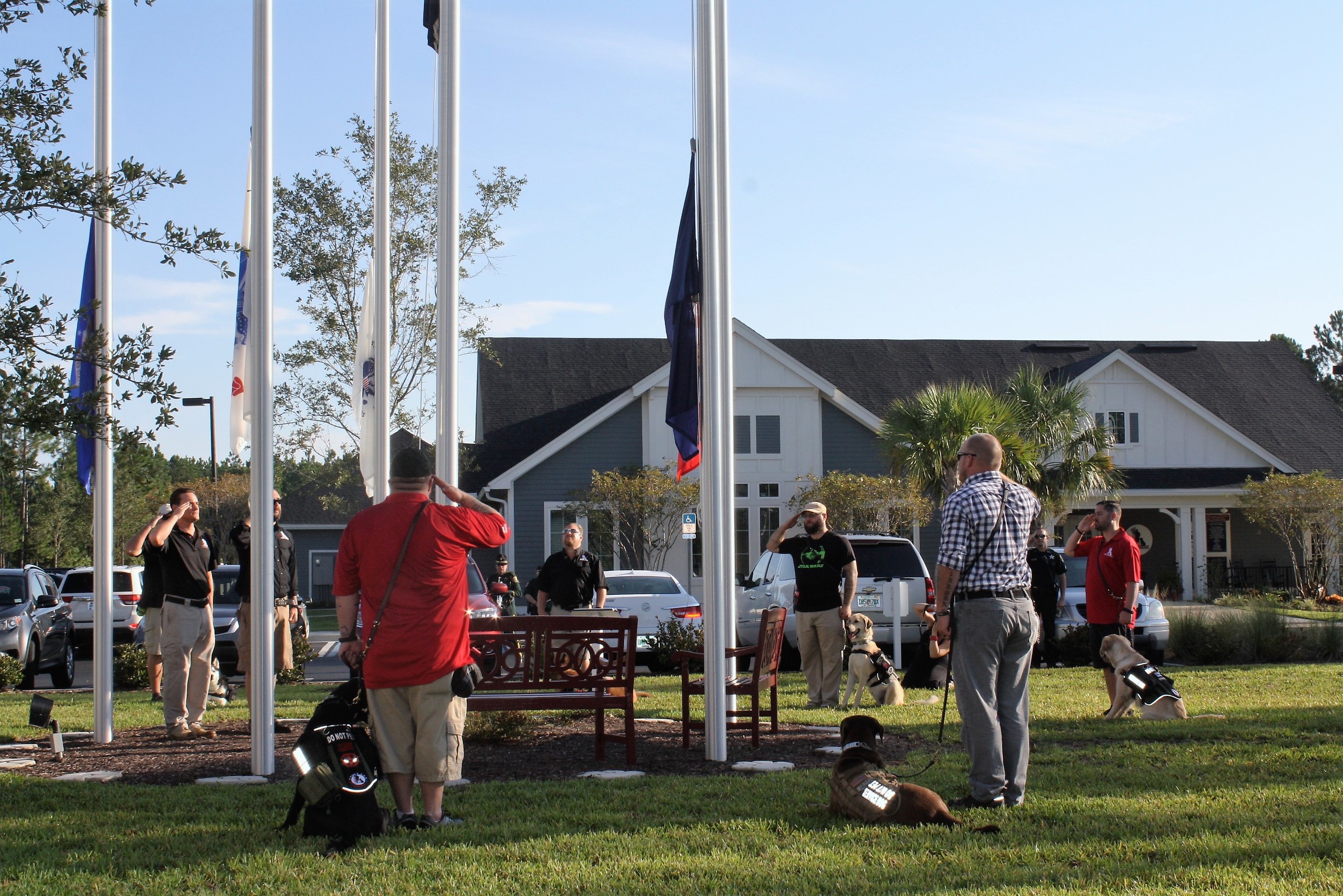 Veterans salute the flag at K9s for Warriors’ 9/11 memorial service held on the 15th anniversary of the terrorist attacks.