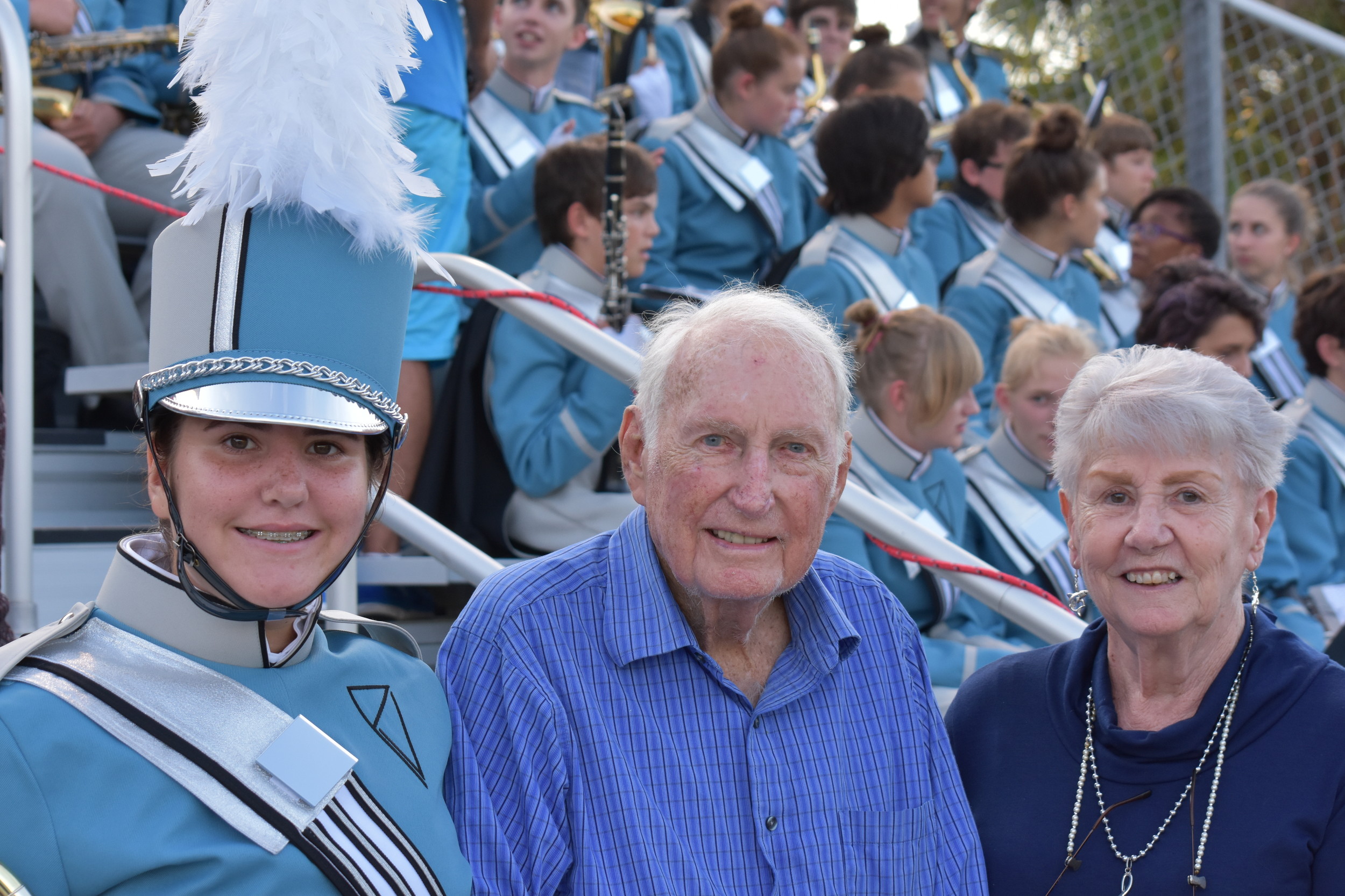 Senior Trombonist Abby Horner in her new band uniform with her grandparents, Duke and Sherry Horner, at the first PVHS home football game on Sept. 9