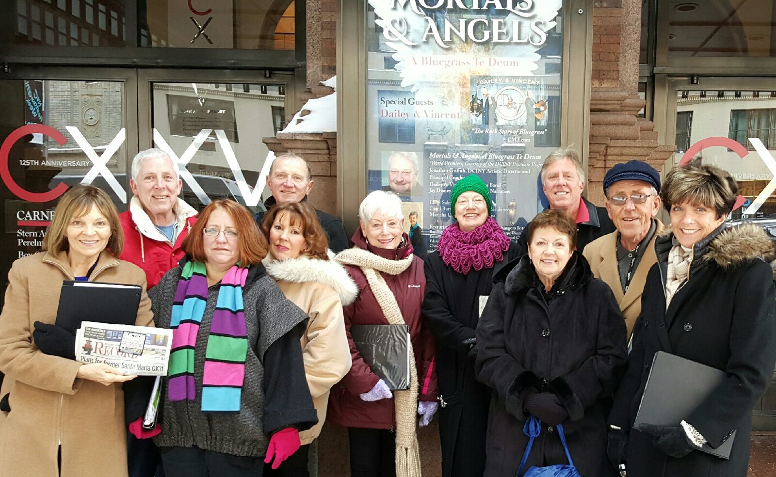 Members of the St. Augustine Chamber Singers outside Carnegie Hall where they performed in January in the premiere of a new composition, “Mortals & Angels: A Bluegrass Te Deum.”