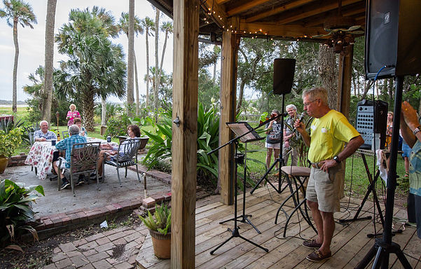 Long-time Ponte Vedra resident Hugo Mickler shares his fond memories of growing up in the area with guests at the Save Guana Now fundraiser.