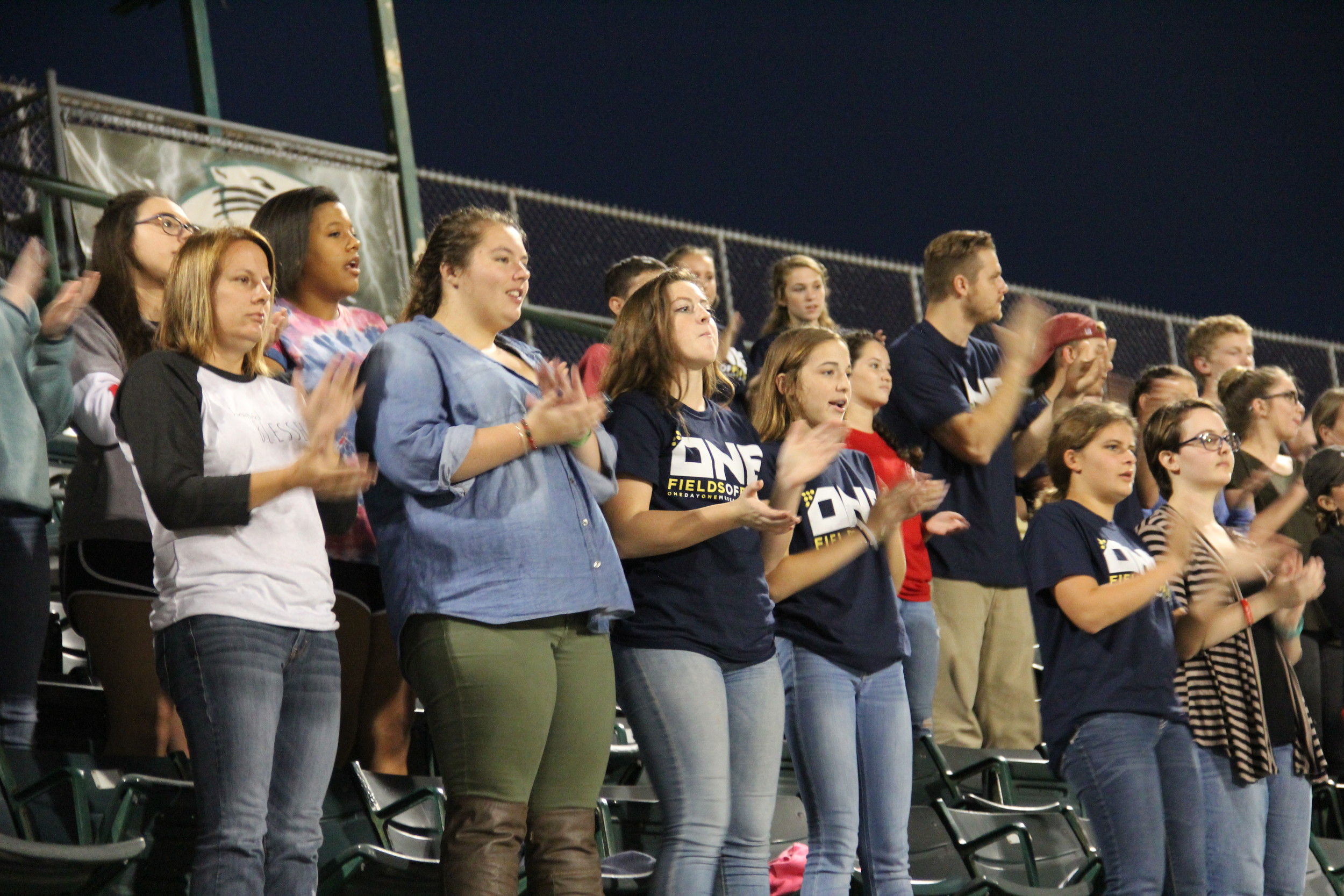 Local students participate in the Fields of Faith gathering held at the Nease High School stadium Nov. 1.
