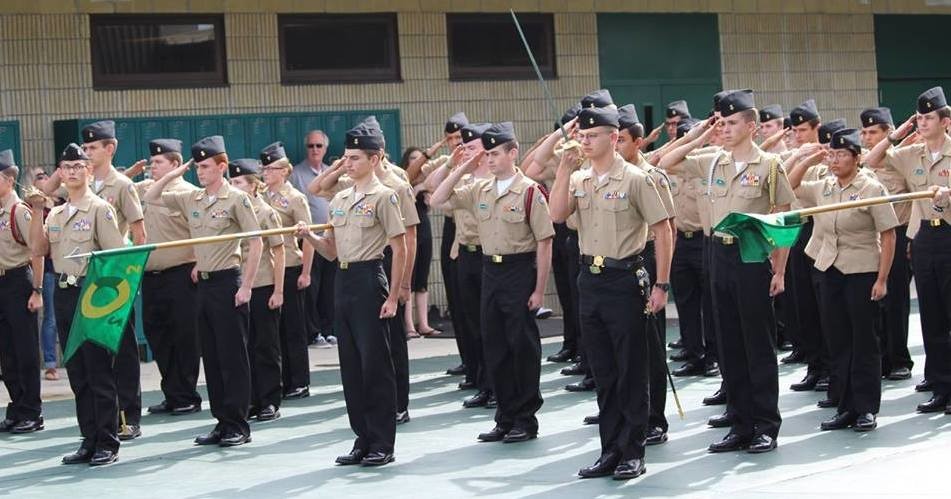 Nease NJROTC cadets stand at attention during the fall Quarterly Promotions & Awards ceremony.