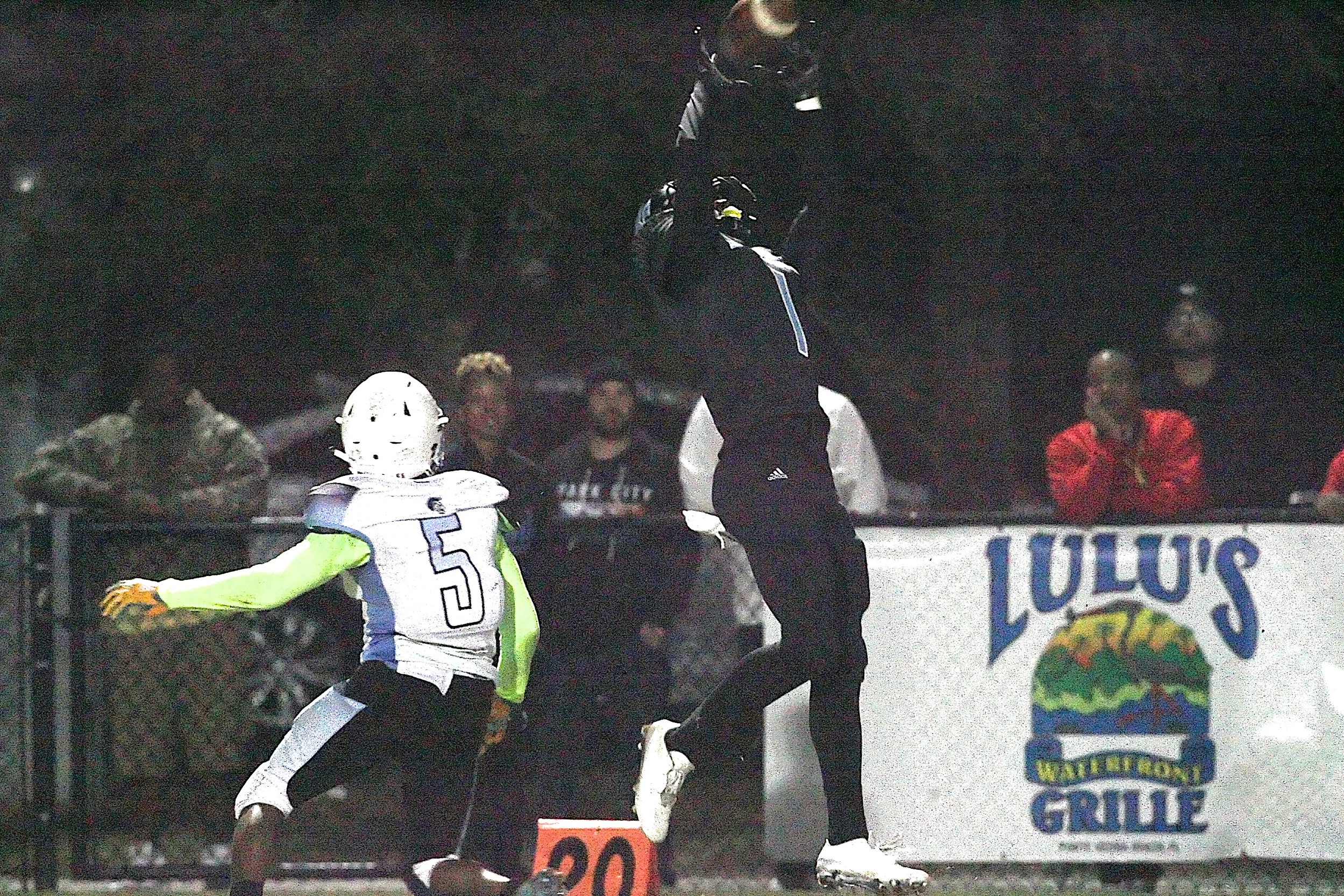 JD Pirris leaps high to pull down a Tronti pass good for 21 yards against Ribault