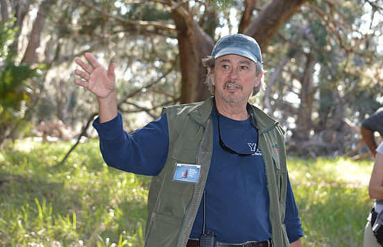 Master Naturalist and Save Guana Now Co-Founder Gary Coulliette explains the flora and fauna to hikers.