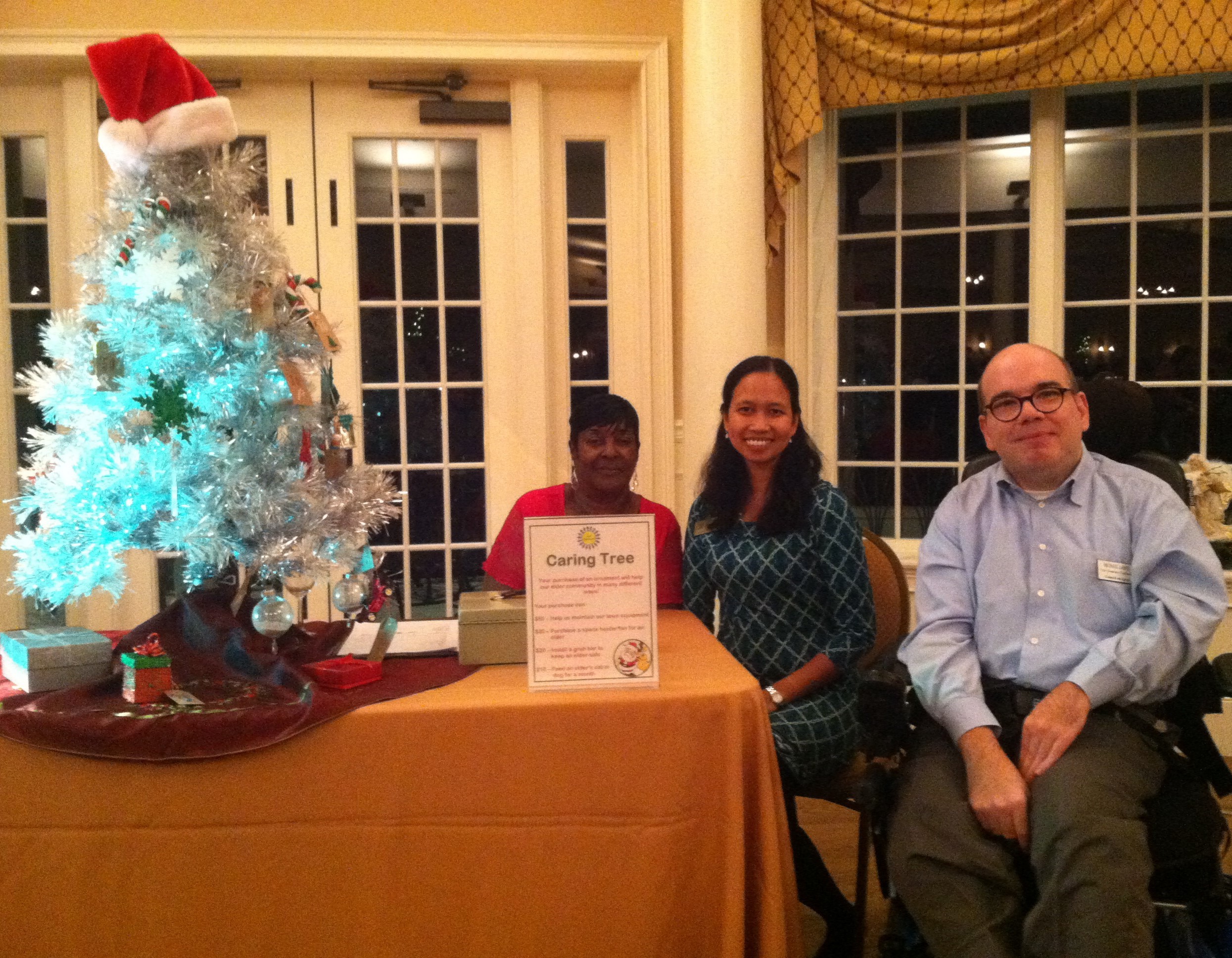Nellie Daniels, Cathy Rabino and Michael Large at Christmas on the River Nov. 20