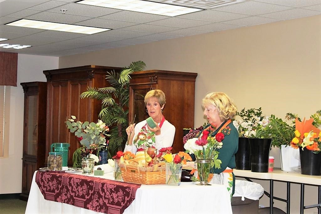 Cathy Snyder of the Sisterhood gives a step-by-step demonstration of flower arranging Downton-style.