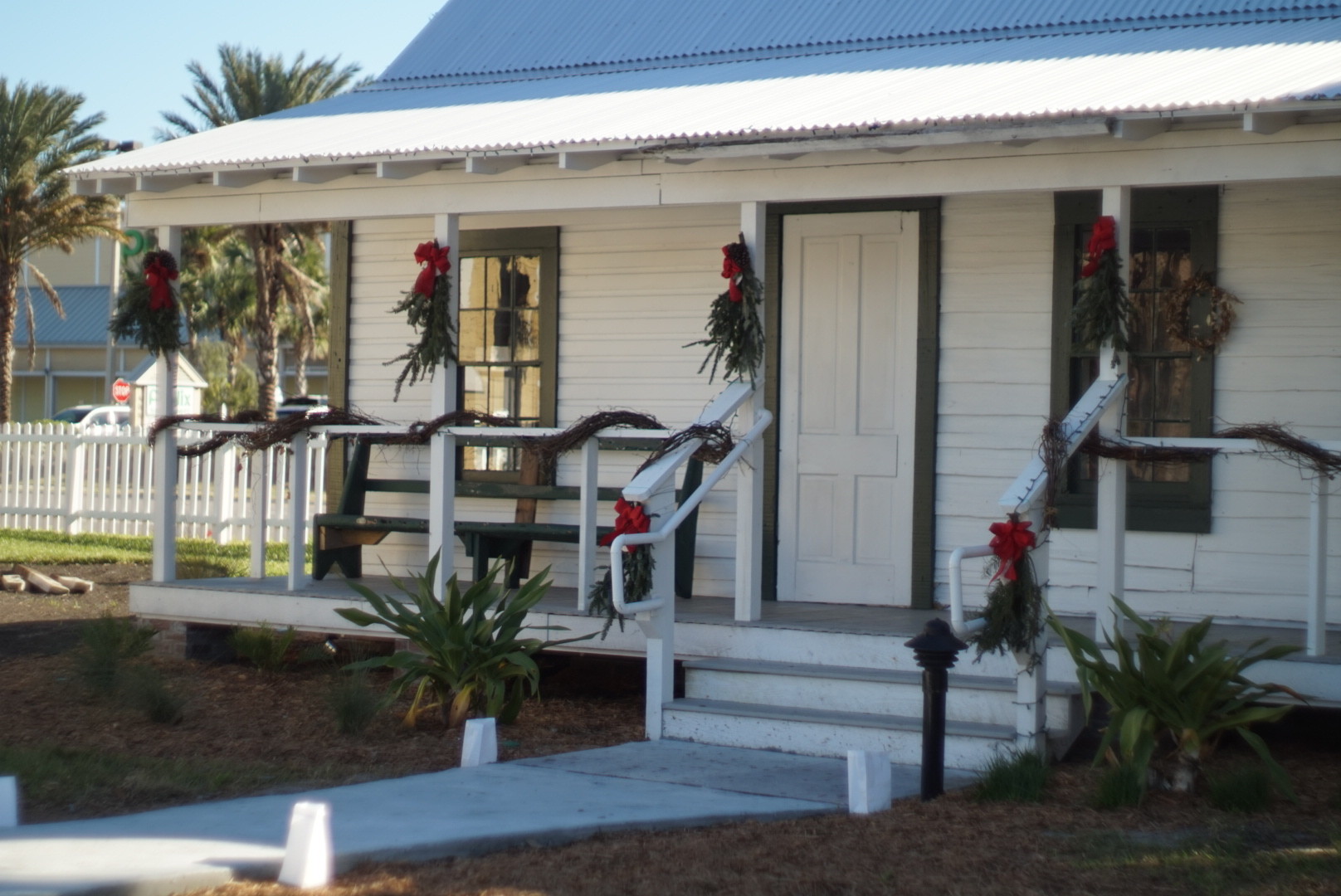 The newly unveiled Oesterreicher-McCormick Homestead receives festive treatment with Christmas trimmings