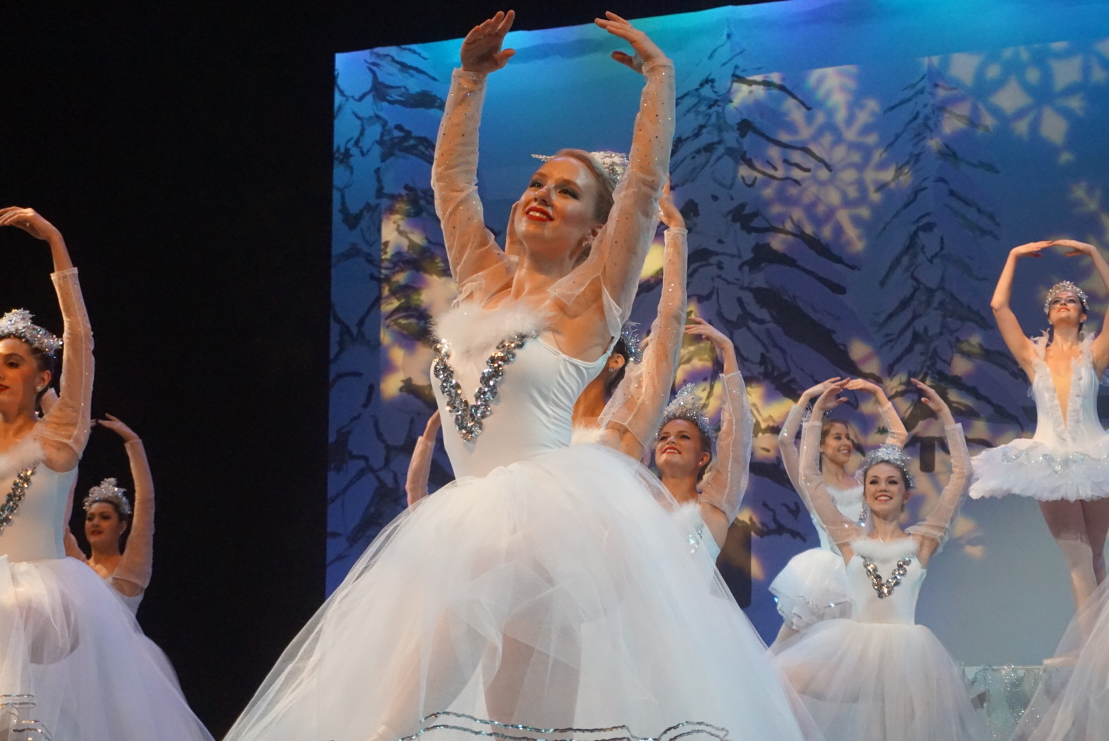 Olivia Tillotson (front, center) dances amongst fellow snowflakes