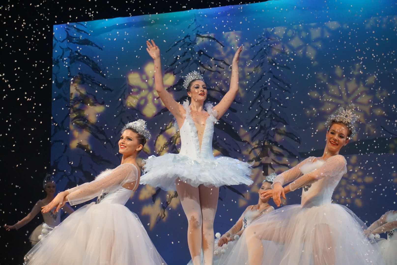 Ally Davis (center) dances as the Snow Queen between Alyssa Billingsley (left) and Hallie Murta