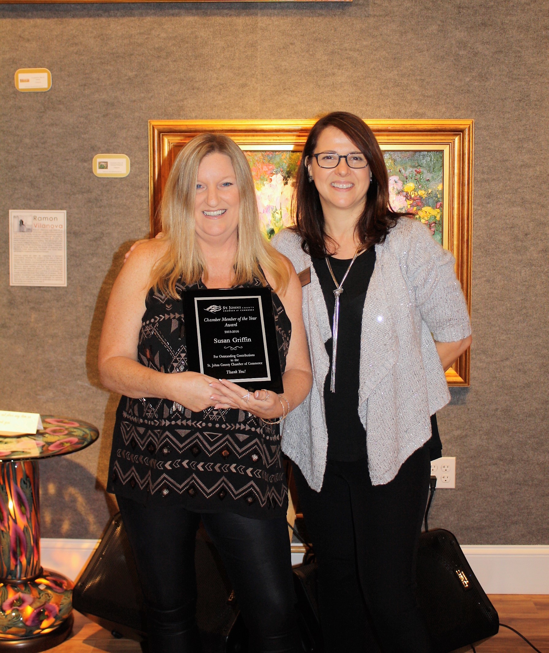 St. Johns County Chamber of Commerce President and CEO Isabelle Rodriguez (right) presents Ponte Vedra Recorder Publisher Susan Griffin with the Chamber Member of the Year Award.