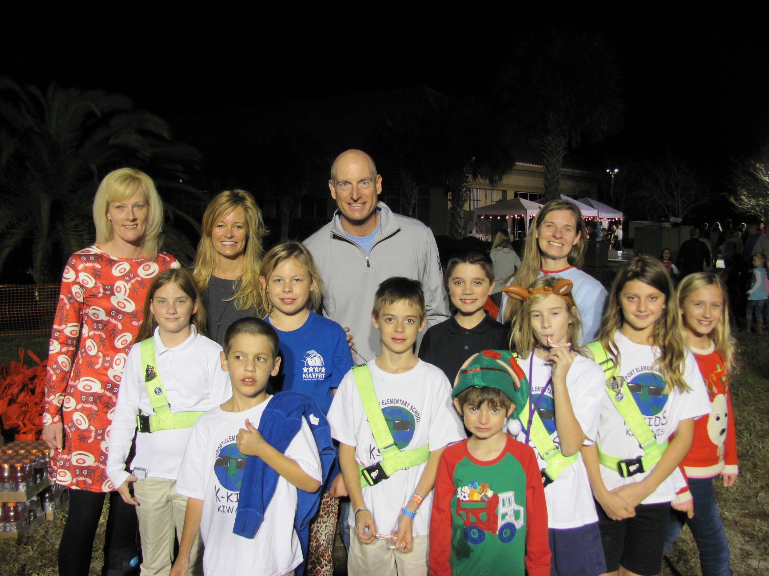Jim and Tabitha Furyk (center) with a group of volunteers at Hope for the Holidays