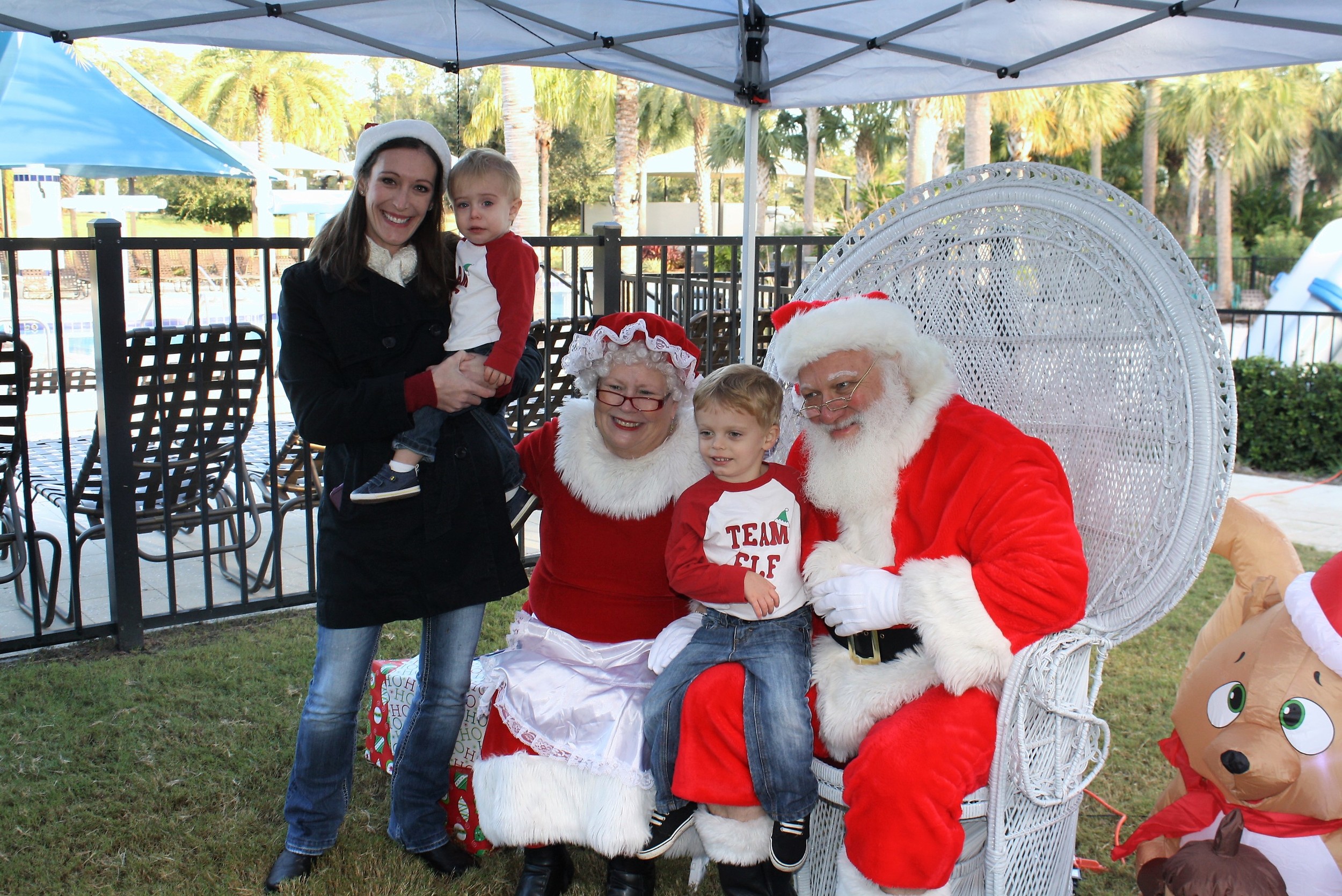 Kristin, Cooper and Wyatt Silberman of Twenty Mile enjoy a visit with Saint Nick and the missus.