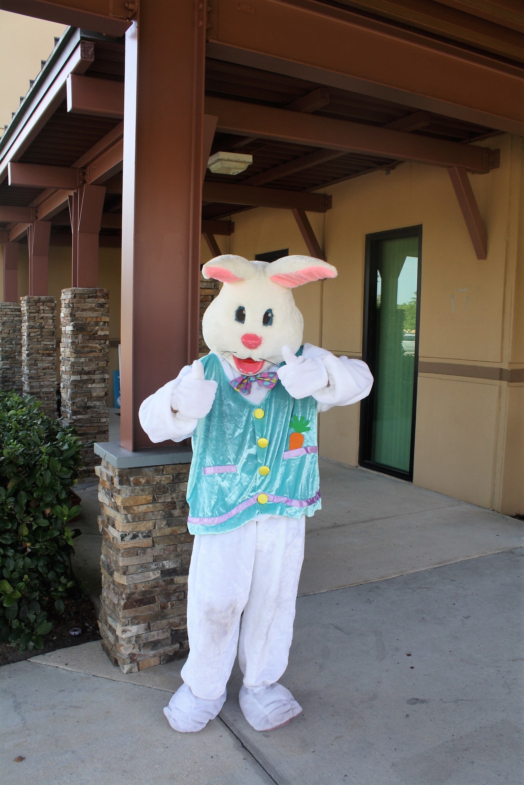 The Easter Bunny welcomes children to Crosswater Community Church's Easter egg hunt