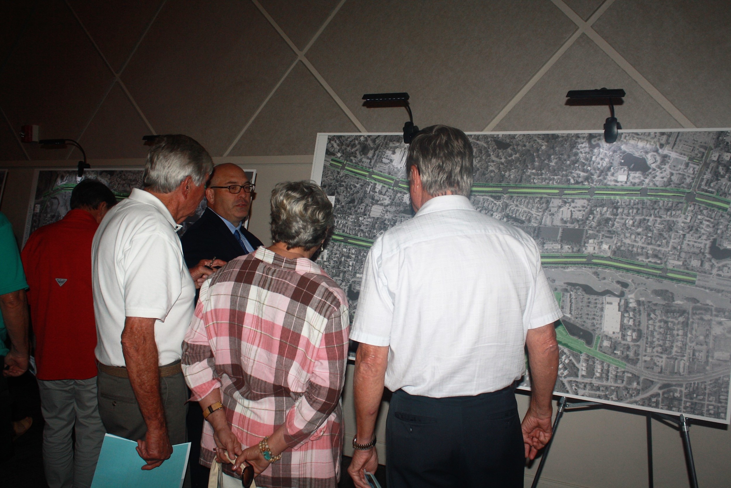 Residents examine the traffic recommendations and ask questions of NFTPO staff.