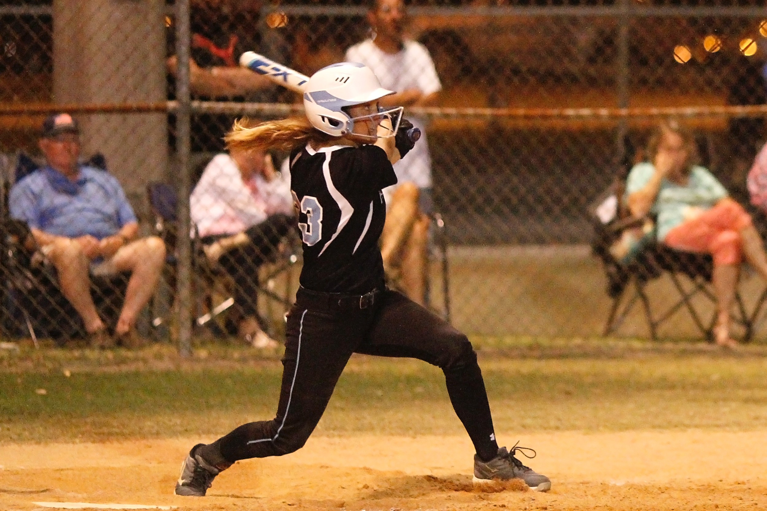 The Sharks’ #23 Kiley Hennessey watches her game winning base hit split the gap in the outfield to drive in teammate Quinlan Richmond.