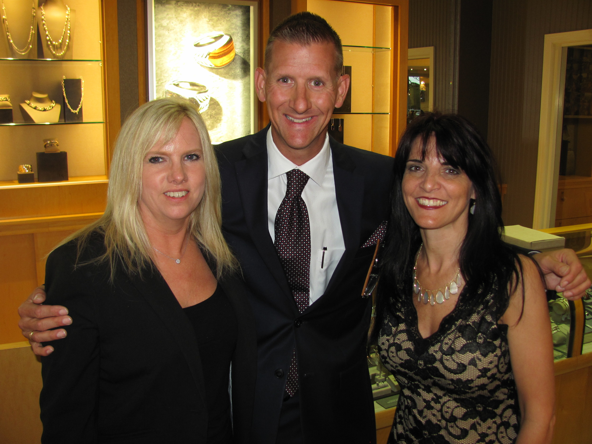 Underwood’s Registered Jewelers Cynthia Riley and Kelli Roberts with Sales Associate Scott Granger