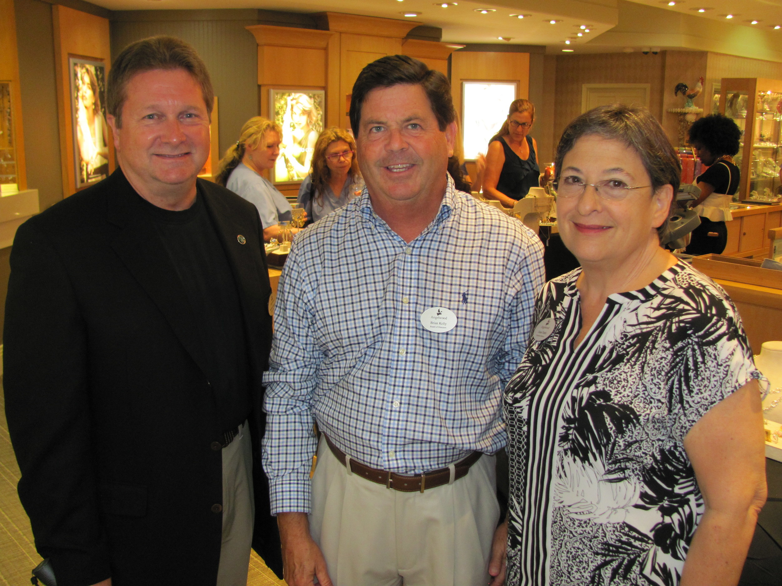 Angelwood Board Members Stephen Ramsey and Brian Kelly with the nonprofit’s Executive Director Diane Tuttle