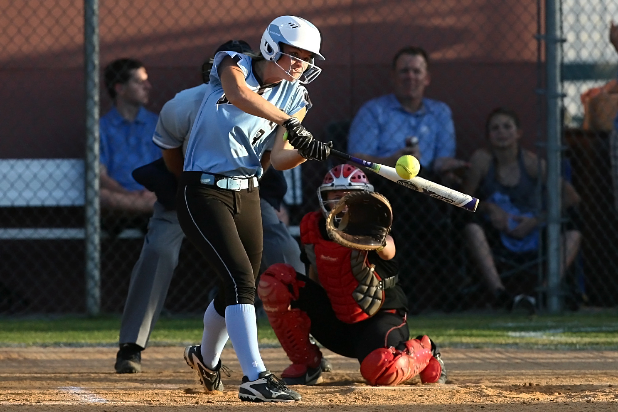 #3 Quinlan Richmond lines a base hit to drive in a run for the Sharks against Parker