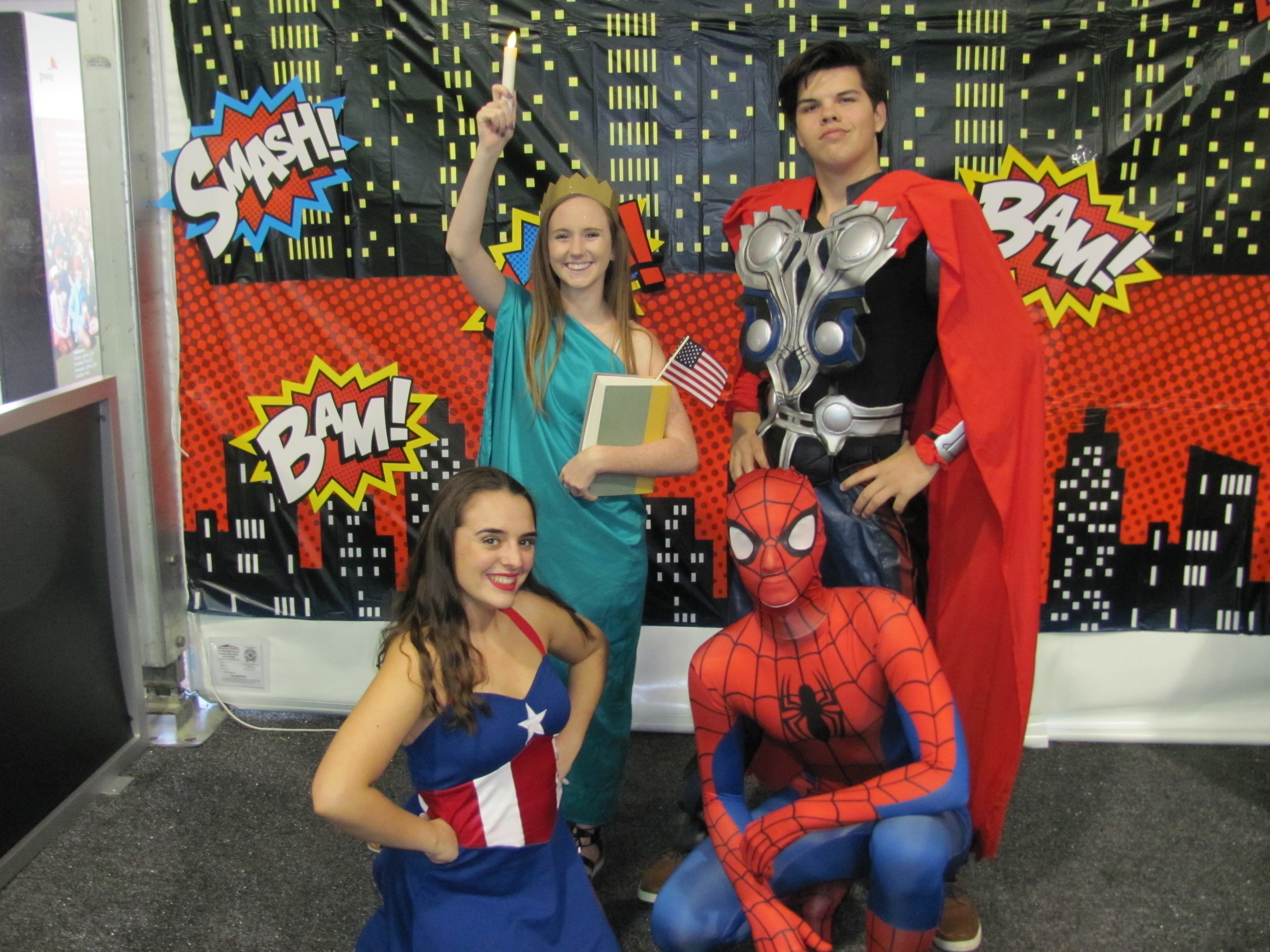 Ponte Vedra High School drama students Addie Spencer, Maria Gaynor, Nick Dondero and Ty Lewin act as superheroes at “These Kids Can Play.”